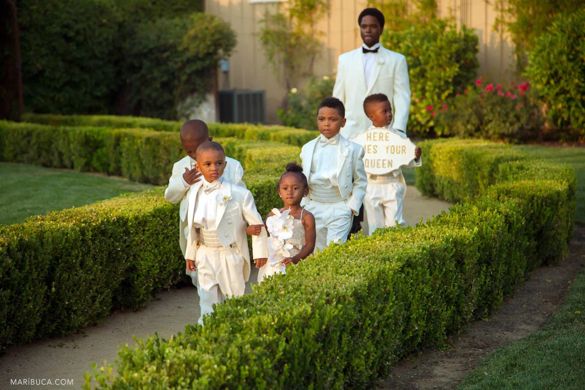 Flower girls and Barrier Rings go to the outdoor in the Newberry Estate Vineyards ceremony.