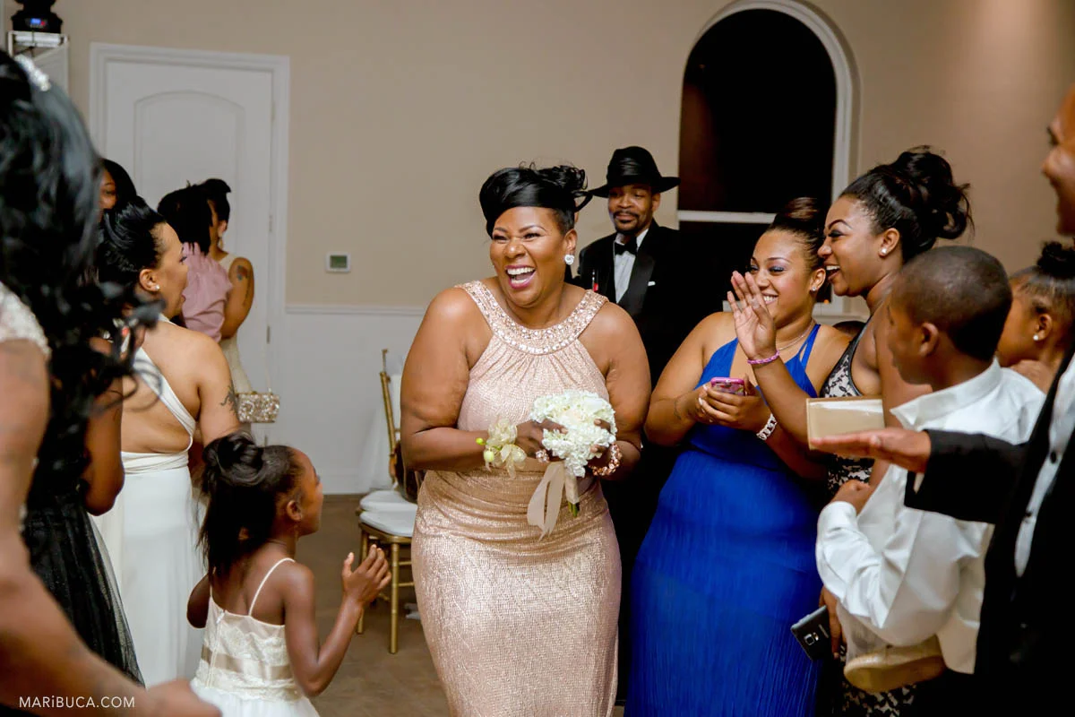 Guests have fun in the wedding, Brentwood, CA and the one of the bridesmaids caught bouquet in the wedding.