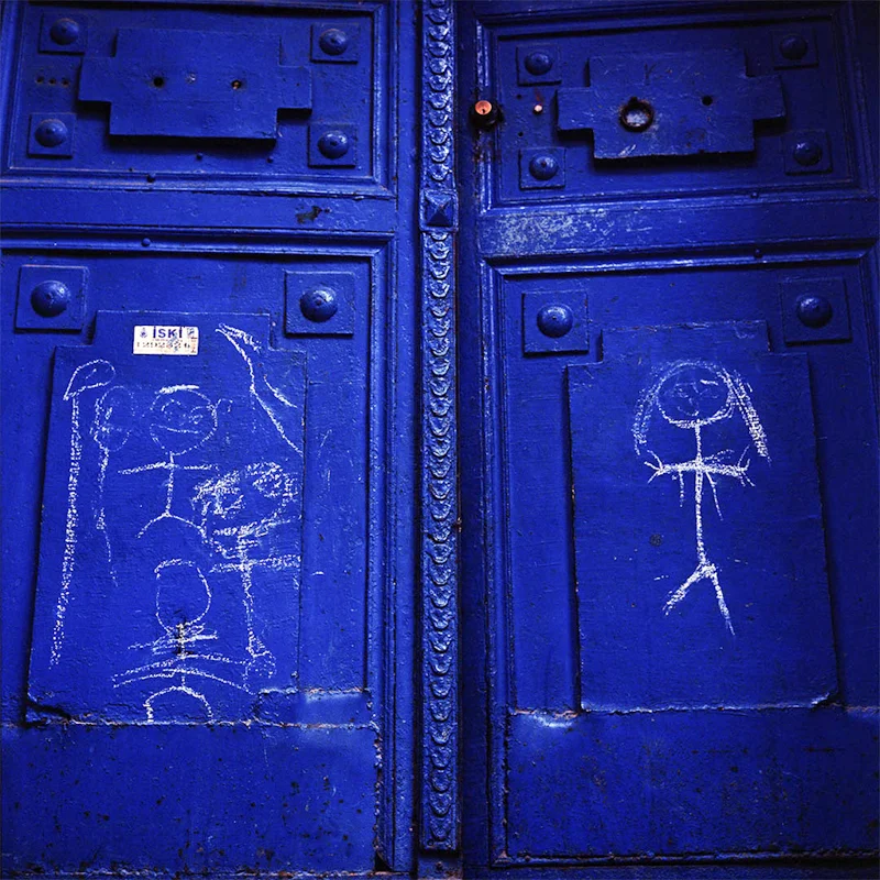Door with childish drawings.
