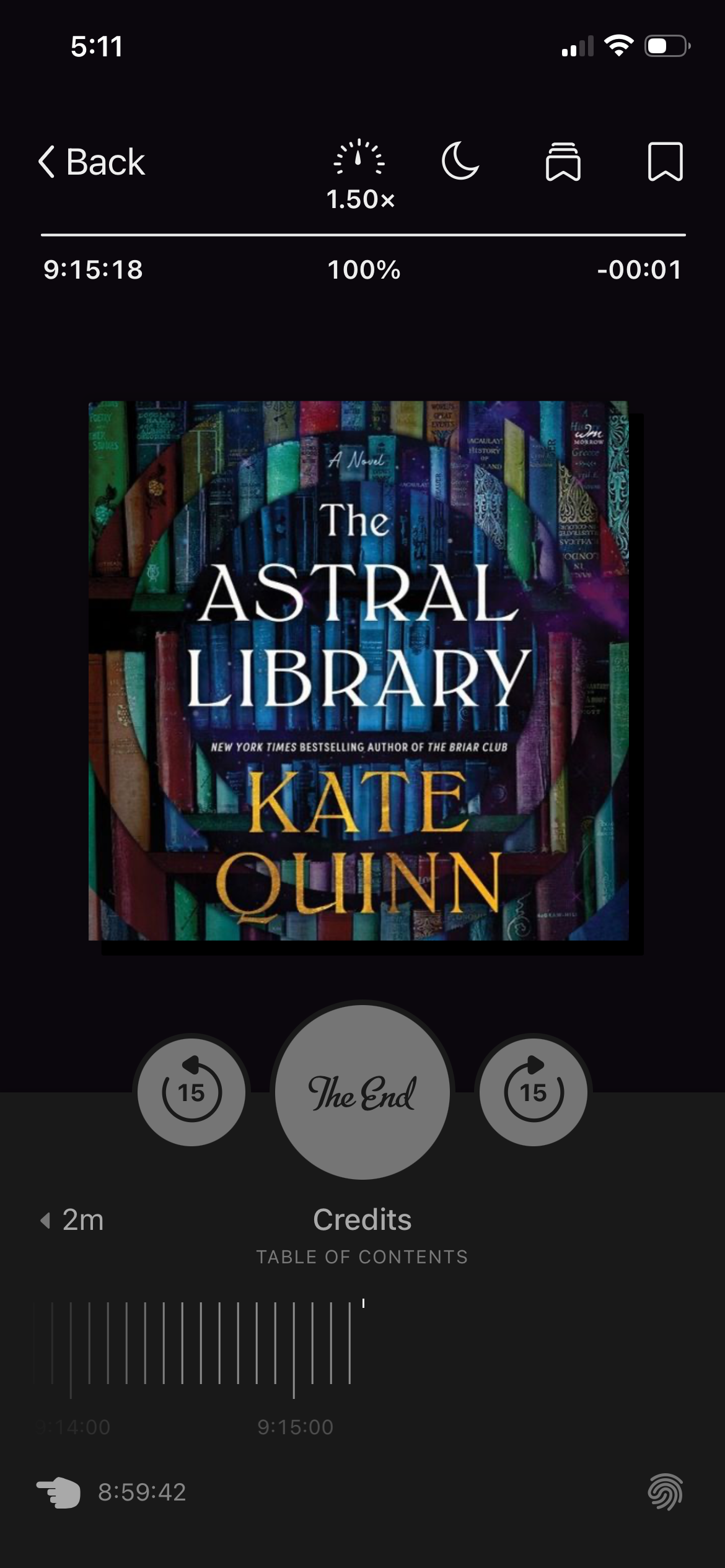 A screenshot of The Astral Library by Kate Quinn in the Libby app. The cover shows shelves of books in a warped circle.