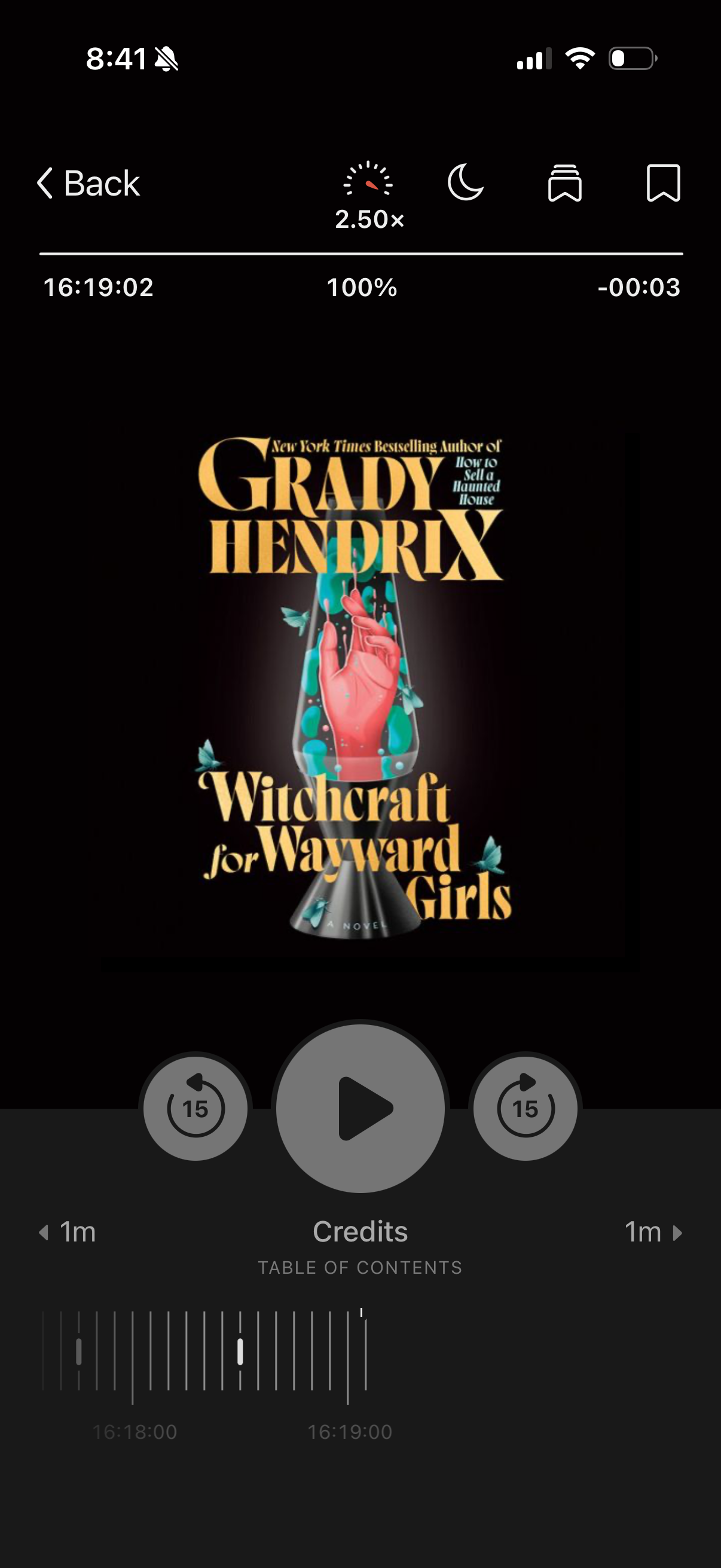 A screenshot of the audiobook Witchcraft for Wayward Girls by Grady Hendrix in the Libby app. The cover shows a lava lamp with a hand inside of it.