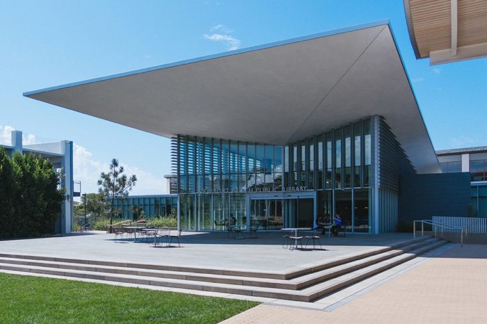 The Newport Beach Public Library featuring a selection of 15 modern archival prints of John Wayne from the John R. Hamilton collection. Photo courtesy of John Wayne Enterprises
