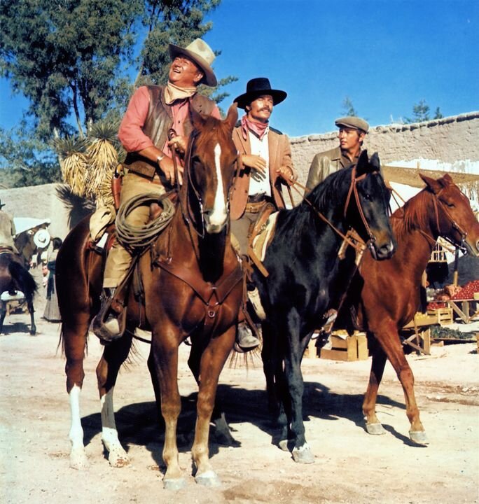 John Wayne, Patrick Wayne and Christopher Mitchum in Big Jake.