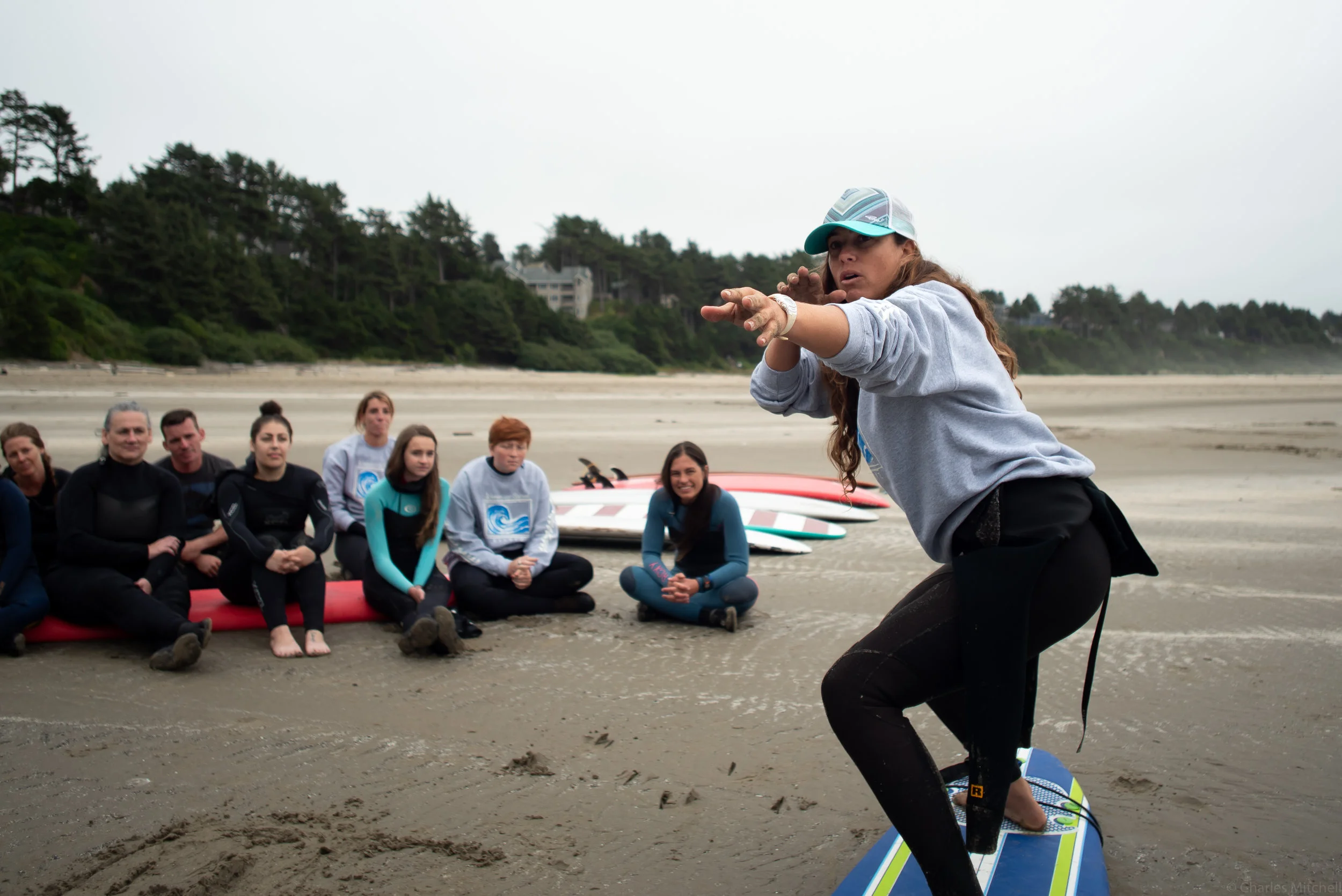 Kelly Potts teaching a surf lesson.