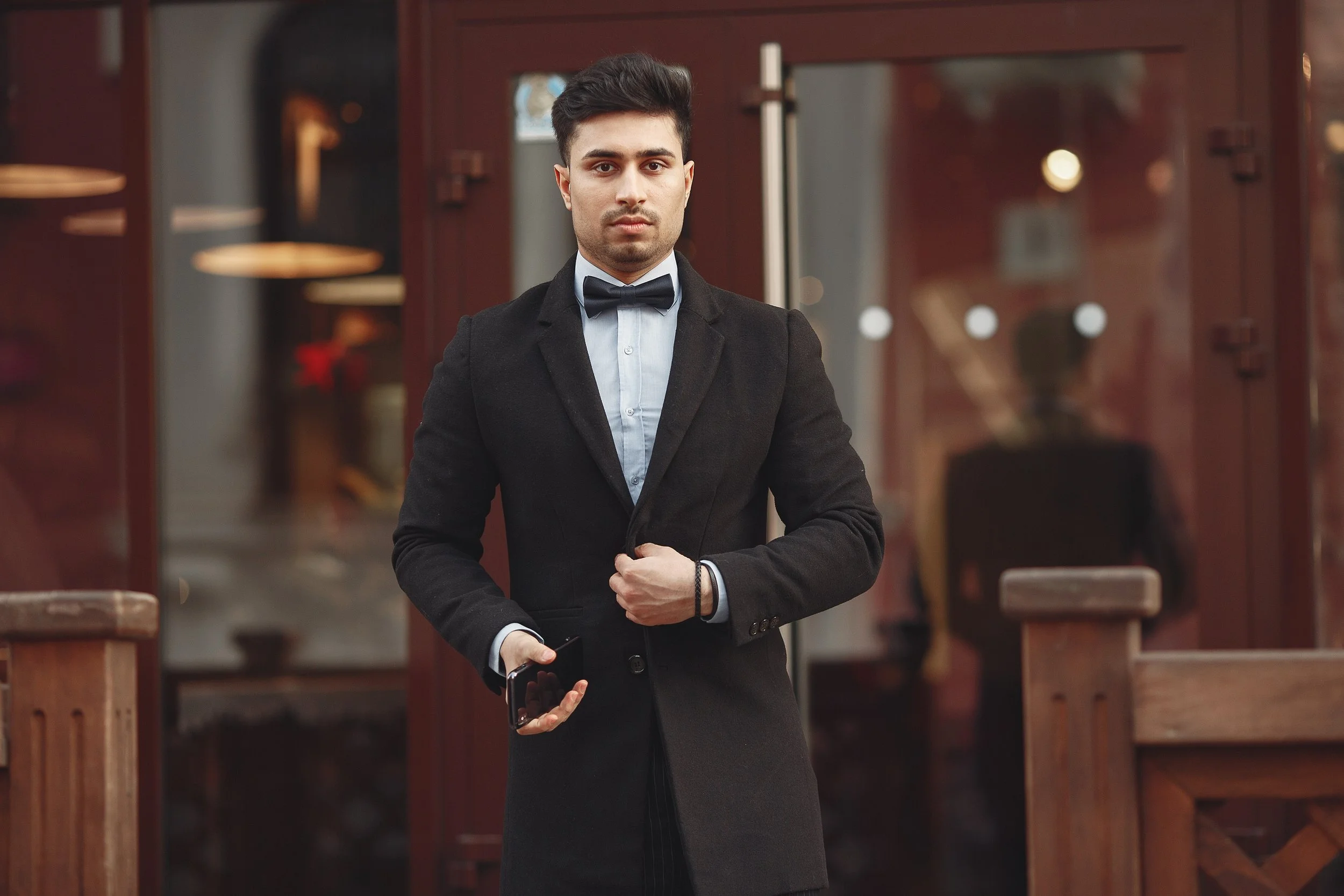 stylish-businessman-black-suit-standing-outside.jpg