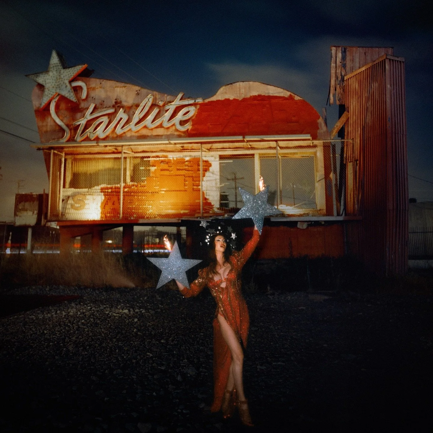 Love at The Starlite Drive In, 2024

Shortly after we shot these photos this sign was leveled and will be replaced with a replica. The original sign dates back to 1950s 💫

Love&rsquo;s ensemble comes from her massive collection of vintage showgirl c