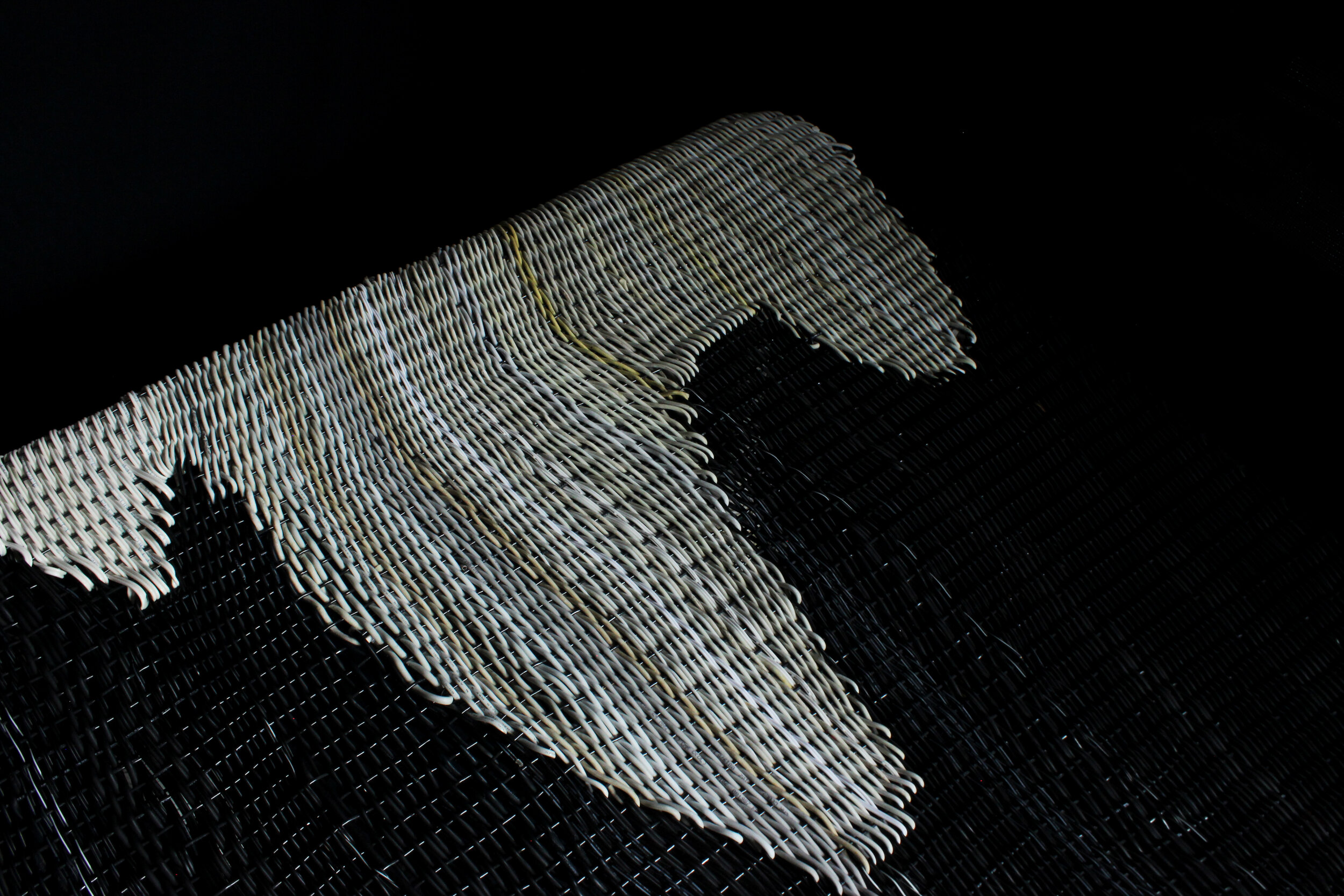 Planar object holder weaving 1.jpg