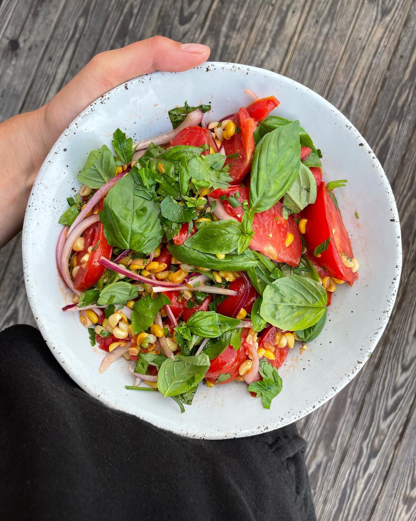 Tomato theme going strong. Tomatoes / charred corn / red onions / garlic / basil / lots of salt / @wearebrightland