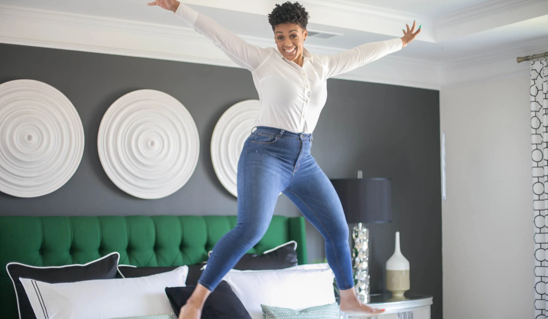 Me jumping for for joy on a 7 day business trip turned momcation in Chicago.