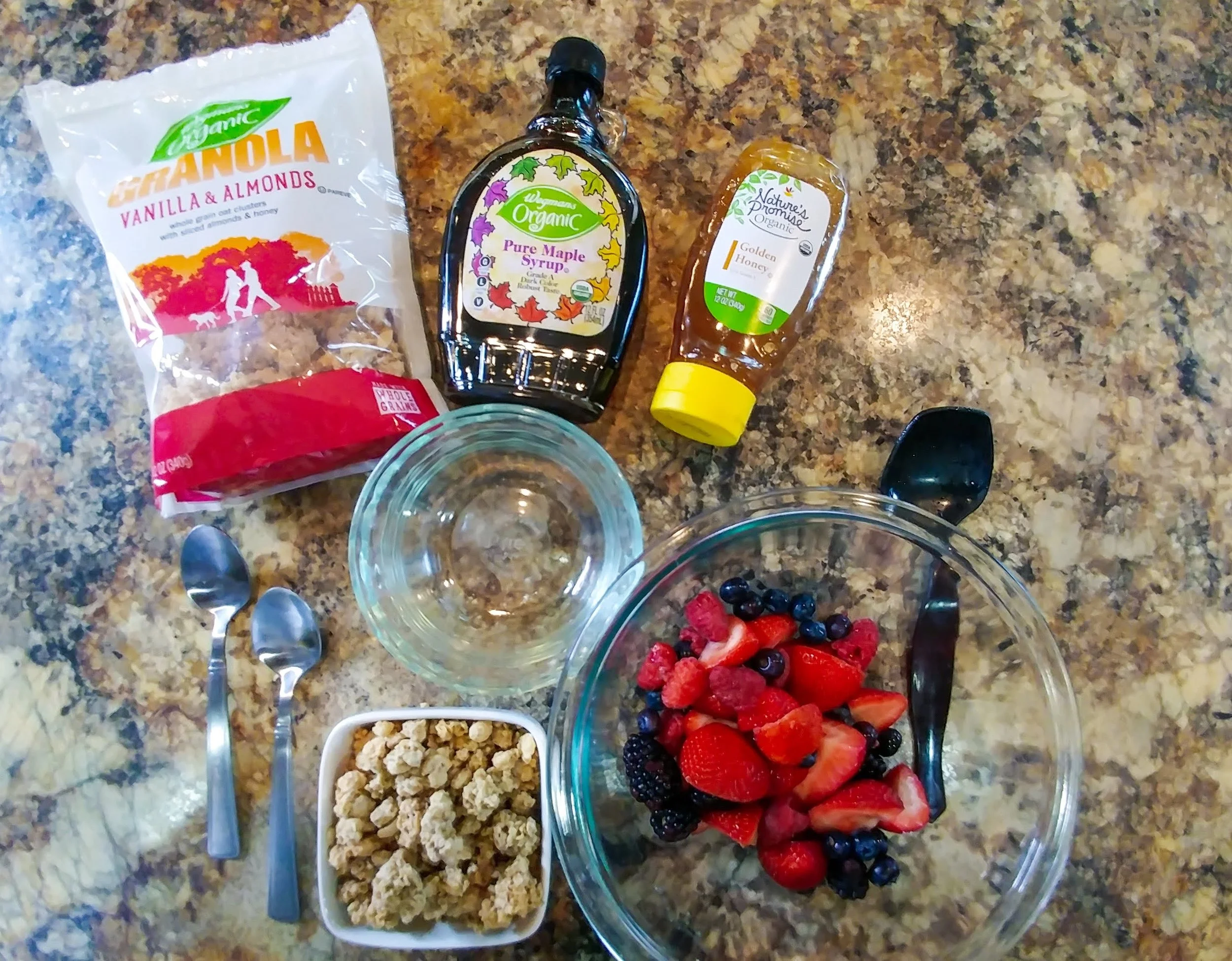 Ingredients: Wegmans Granola Vanilla and Almonds, Wegmans Organic Pure Maple Syrup, Nature’s Promise Pure Honey, organic fresh strawberries, raspberries, and blueberries.