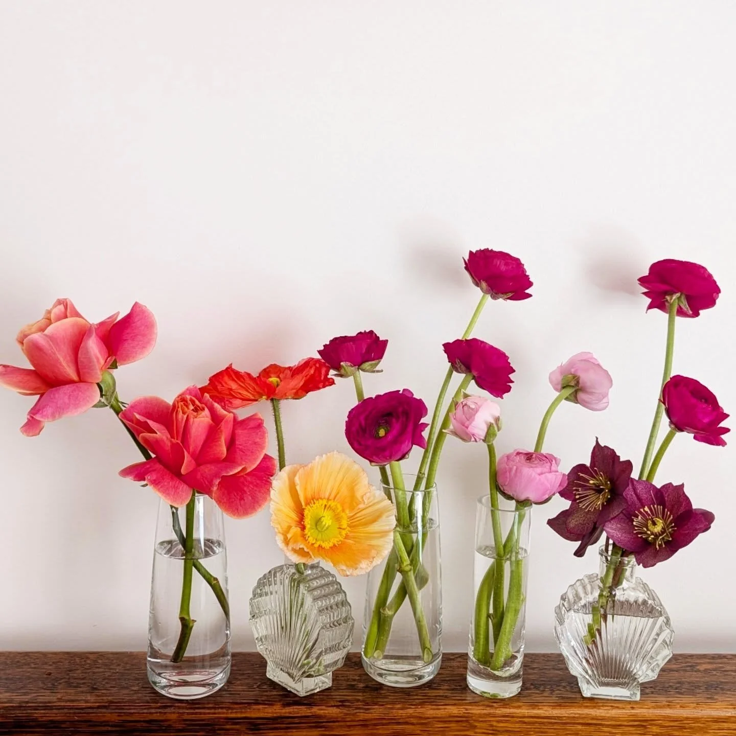 Ever popular bud vases - perfect for fitting in amongst shared meals and drinks and adding a pop of colour to the tablescape 

#budvases #weddingreception #vases #tablestyling #weddingflowers #geelongwedding #springflowers #springweddings