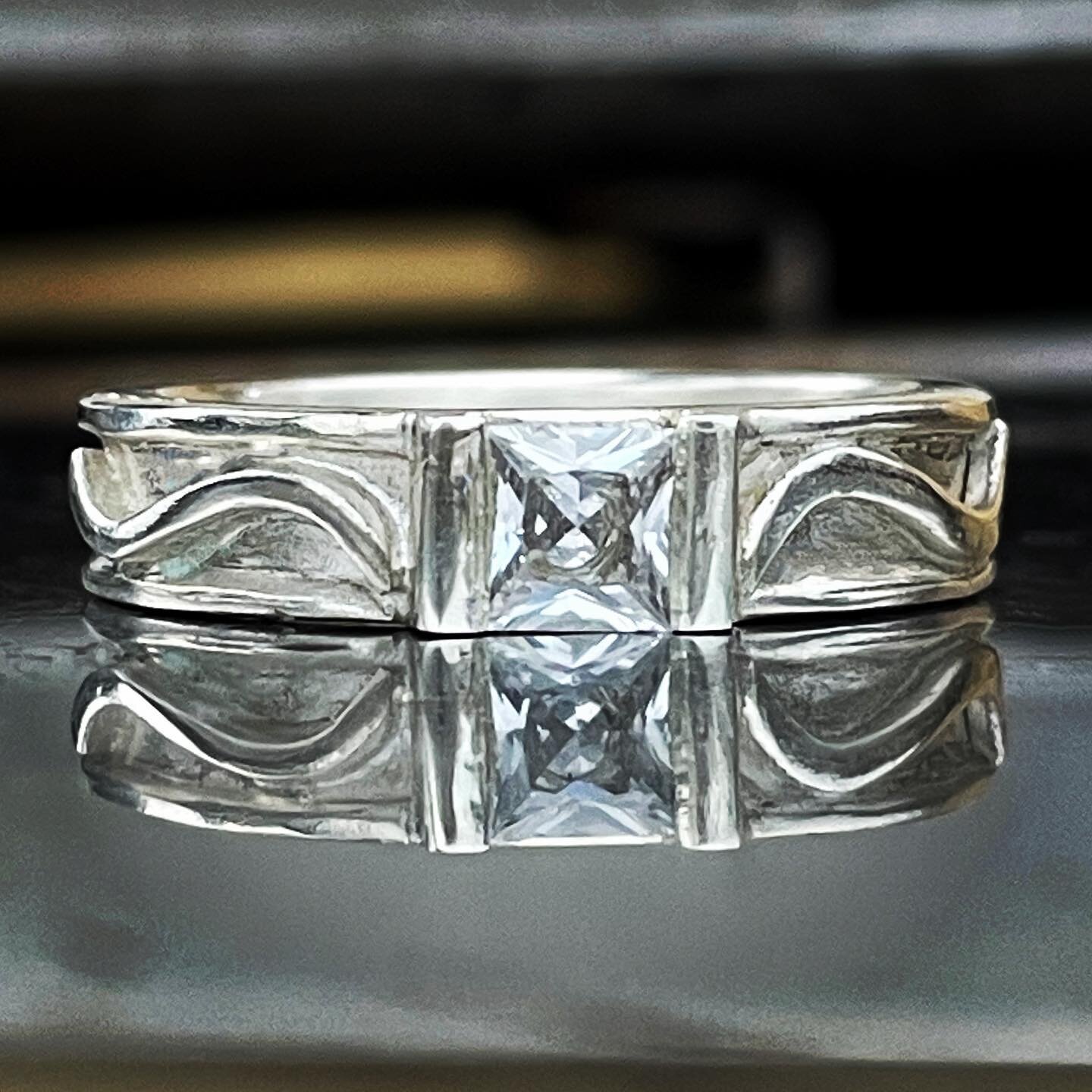 This argentium gents ring with princess cut stone was a lot of fun to make.  The reflection from the steel barbecue doubles the effect!! I&rsquo;m cheered to imagine how many glorious Rotto summers have been celebrated here, despite the wild weather 
