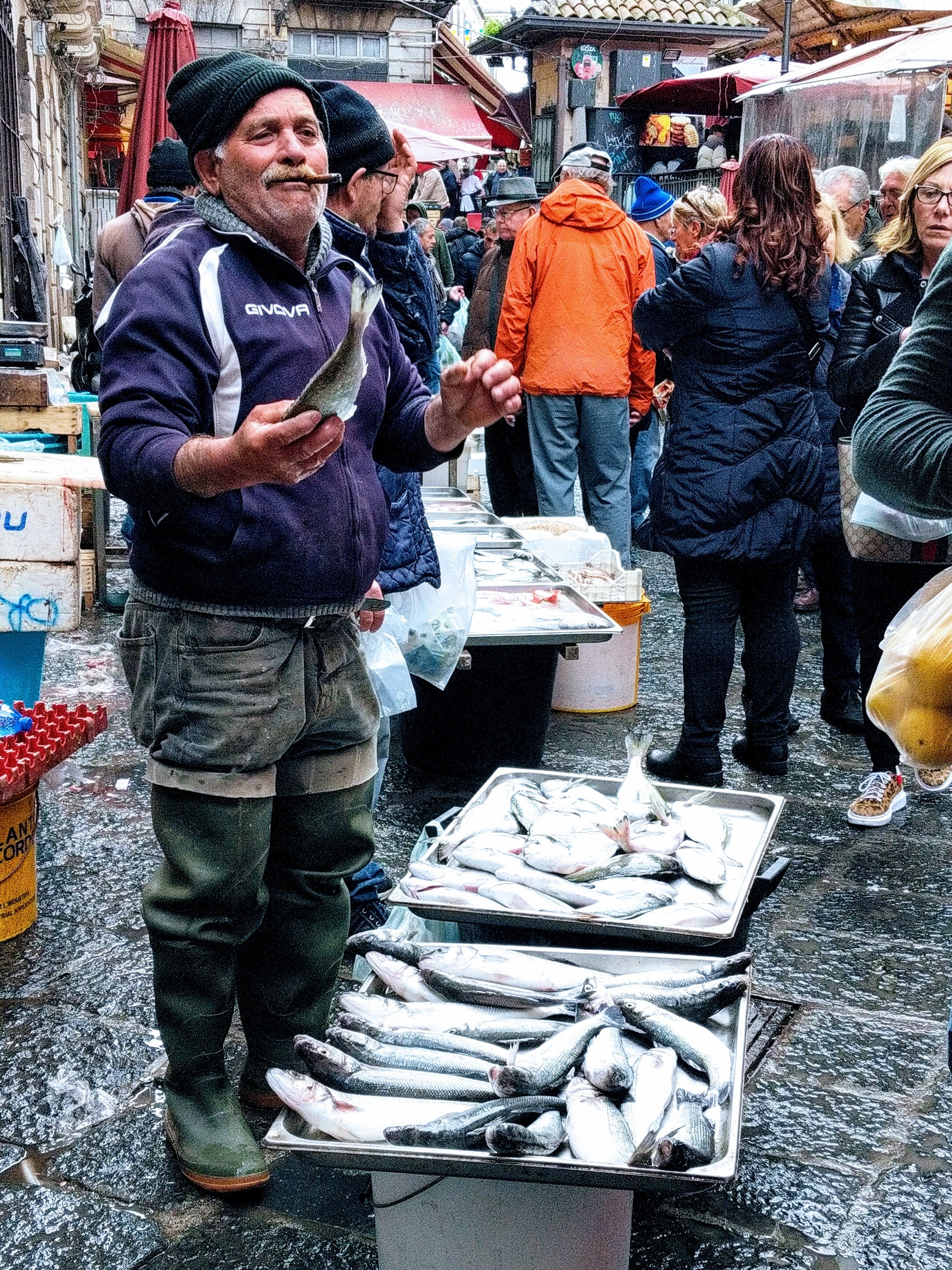 Fishmonger at the fish market in Catania, Sicily