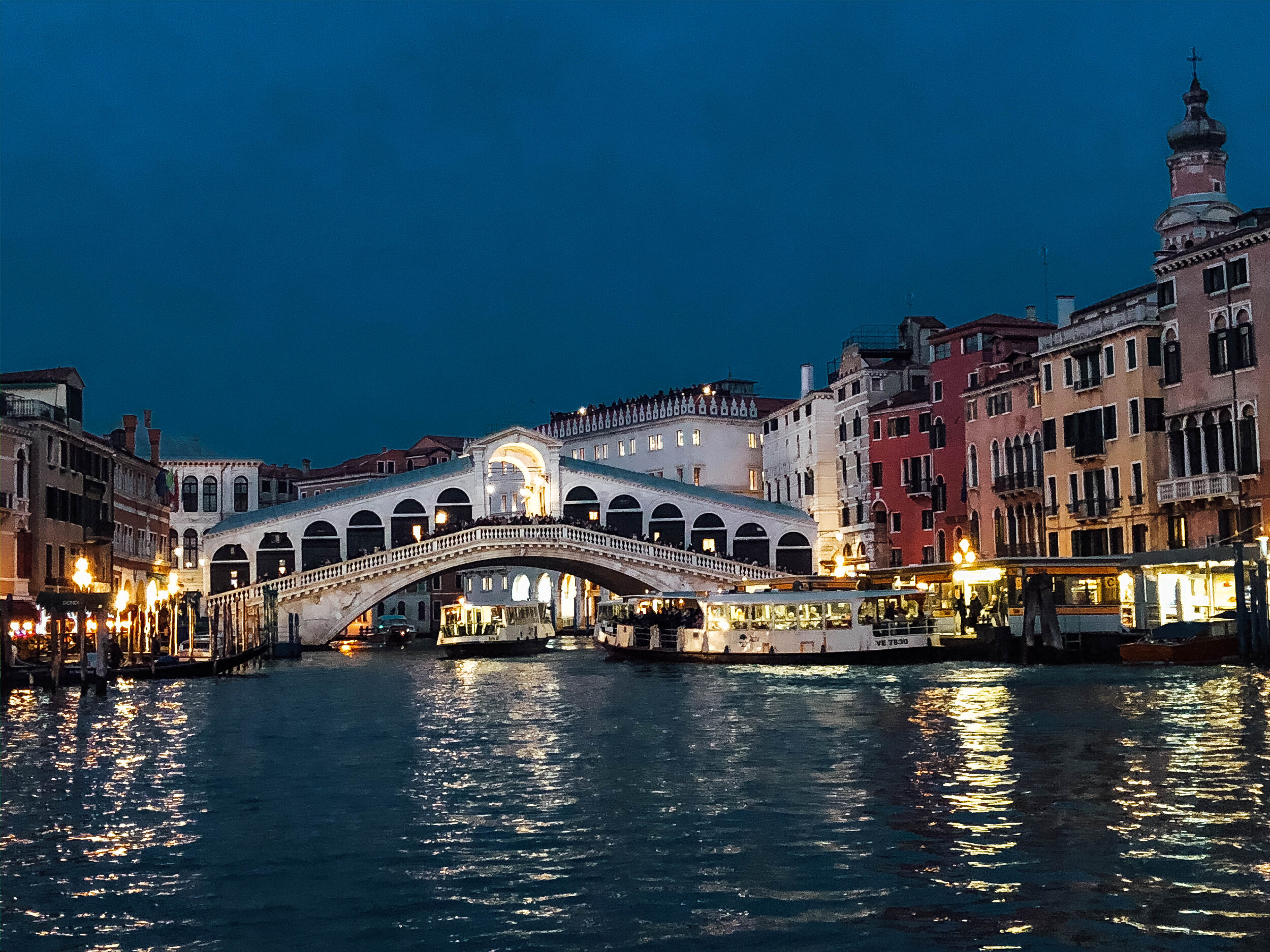 Rialto Bridge at night in Venice, Italy