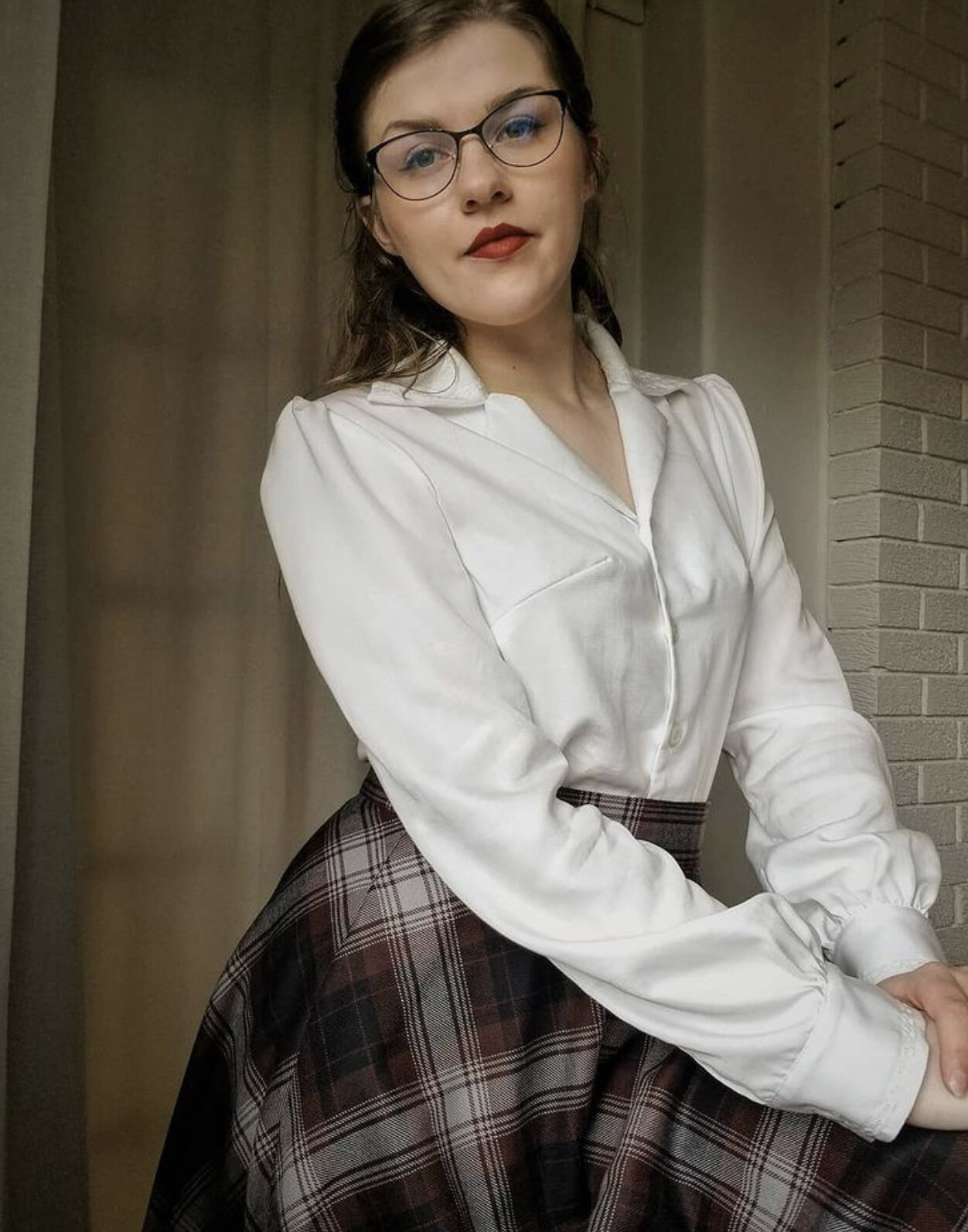 Hailey is pictured wearing her ‘Lillias’ blouse and ‘Rosie’ Lunar tartan skirt