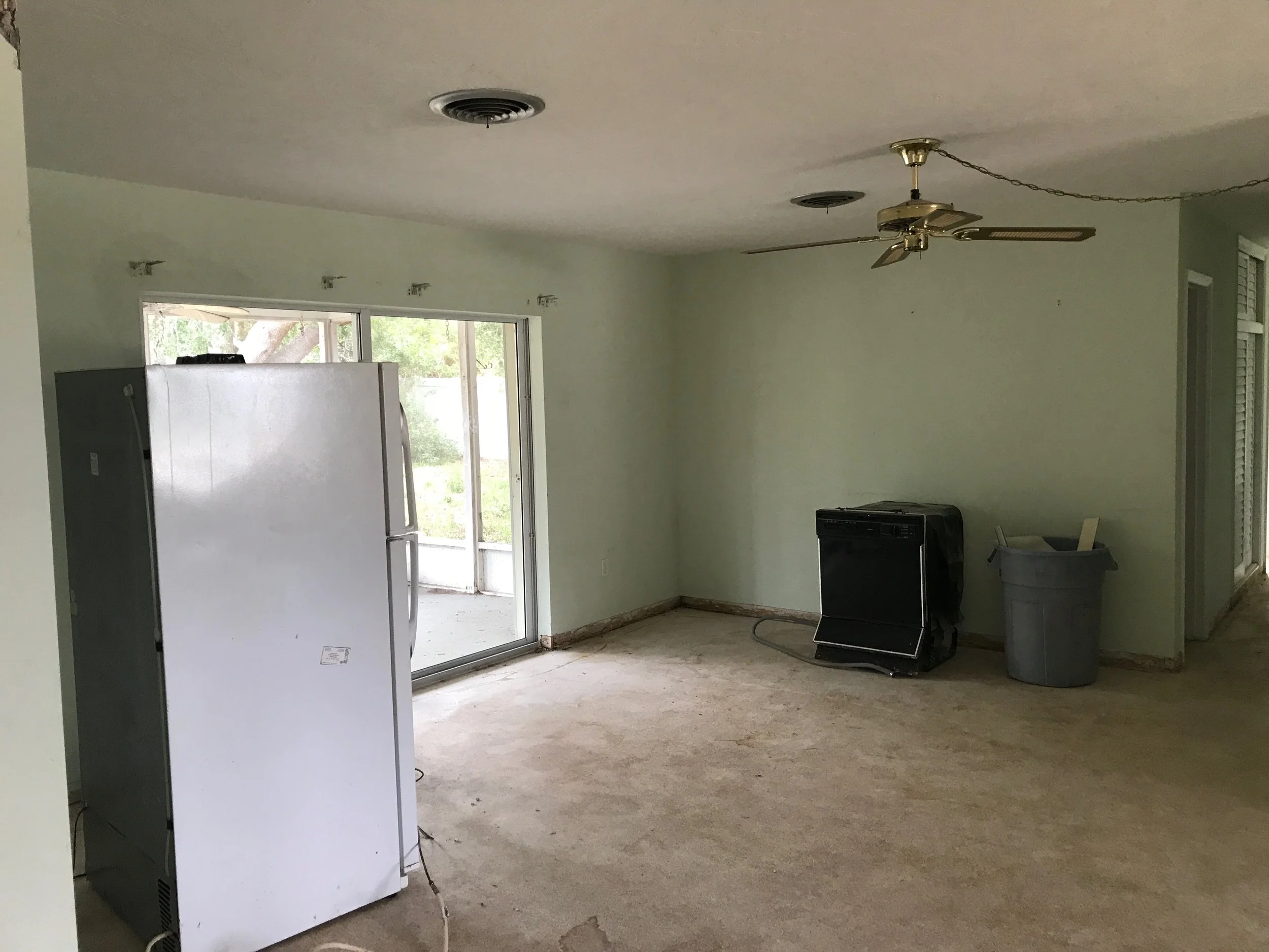  Dining area before (check out the awful shape the terrazzo floors were in! 
