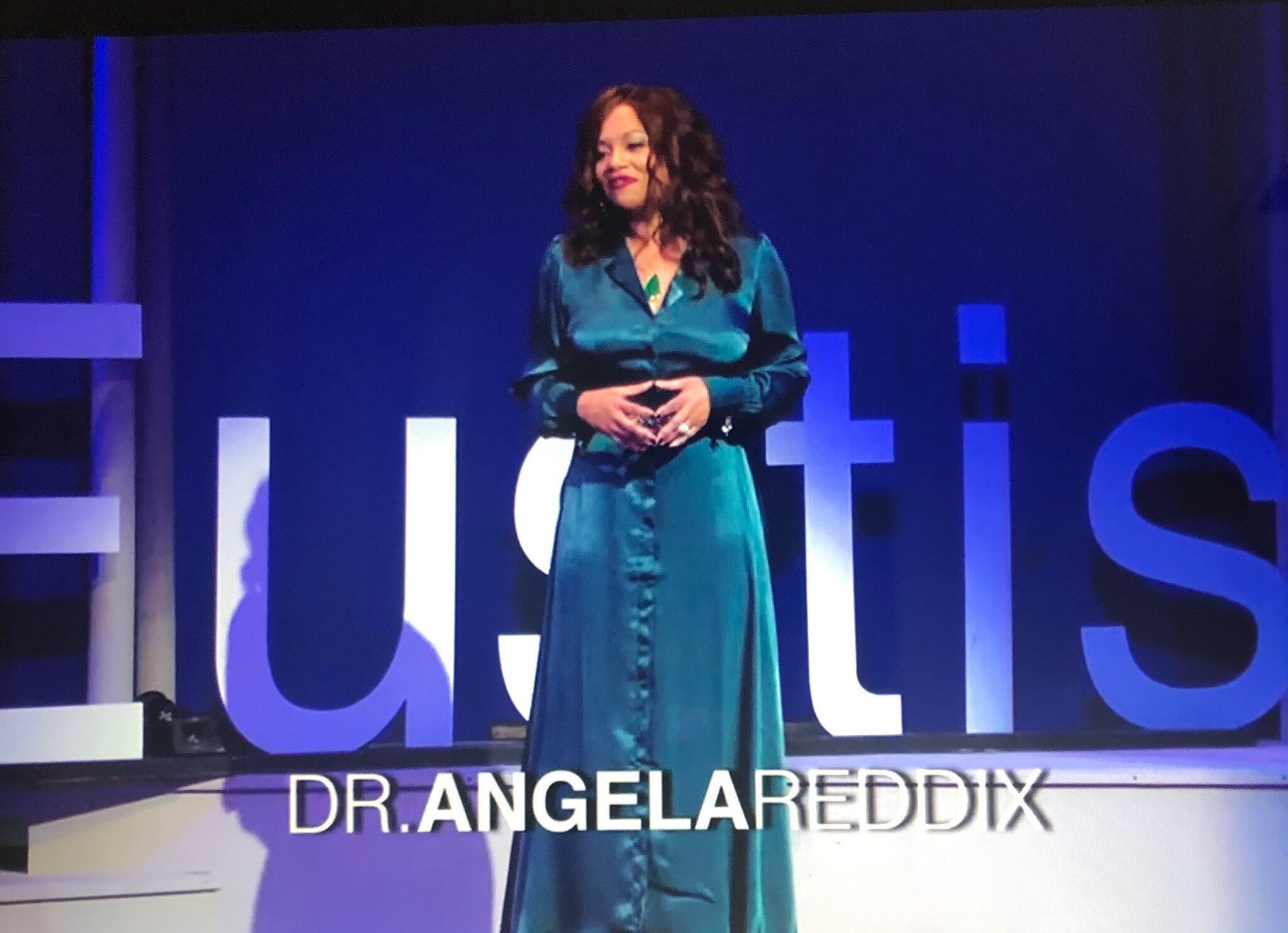 Angela Reddix on TEDx Stage.jpg