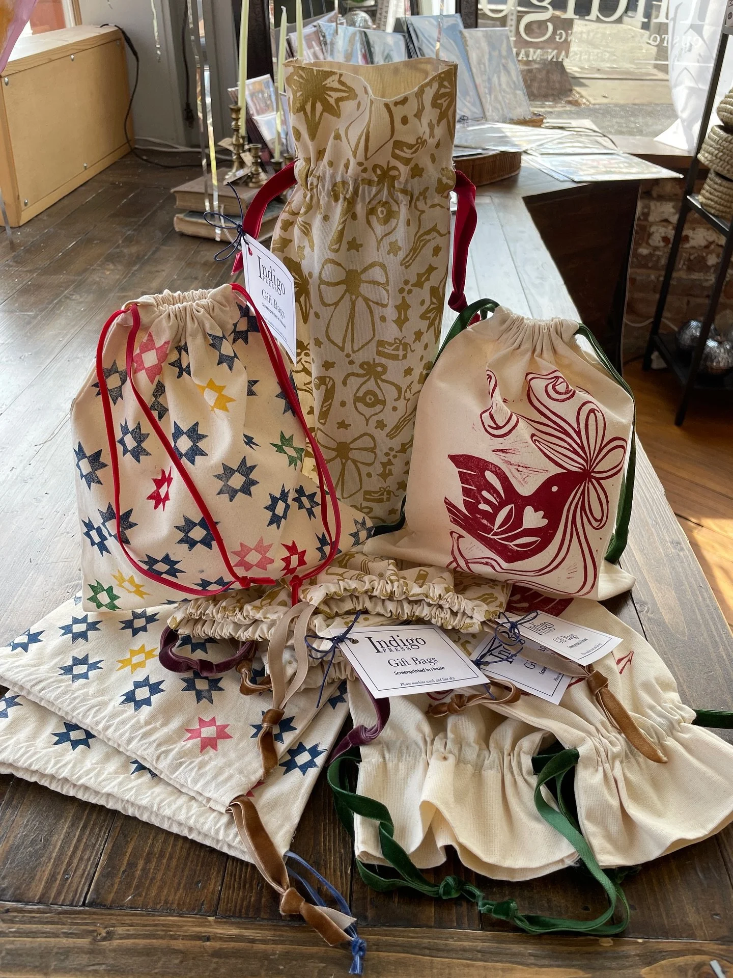 We&rsquo;ve been printing! And by we, I mean Indigo Press!
@nicoledavenportstudio @sydney.creates &amp; @kimeikeo  have printed and screenprinted our custom designs on canvas gift bags. Our designs come in small, large, and wine bottle sizes. Each fi