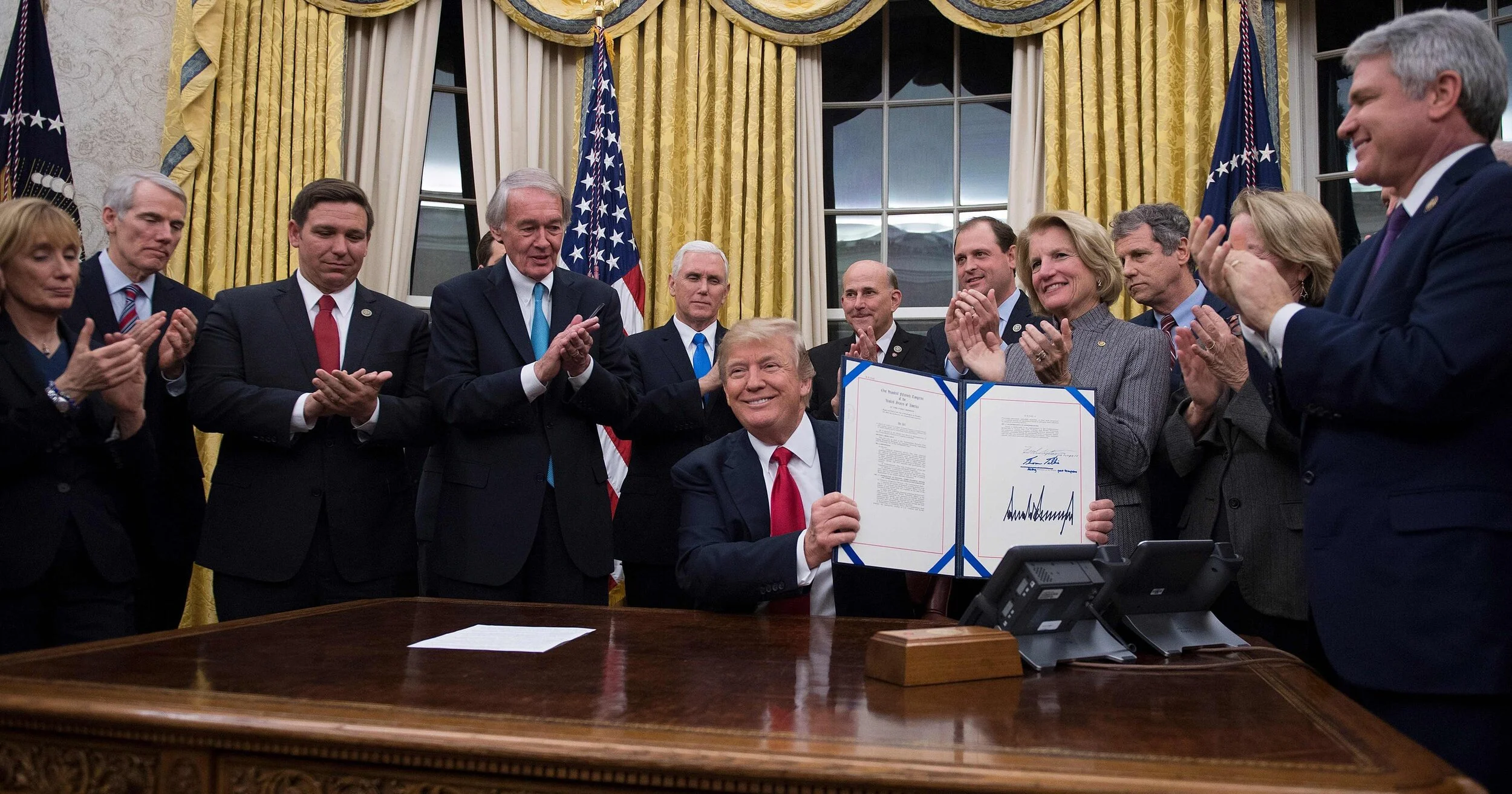 Trump signs $2 trillion coronavirus relief bill as the US tries to prevent economic devastation