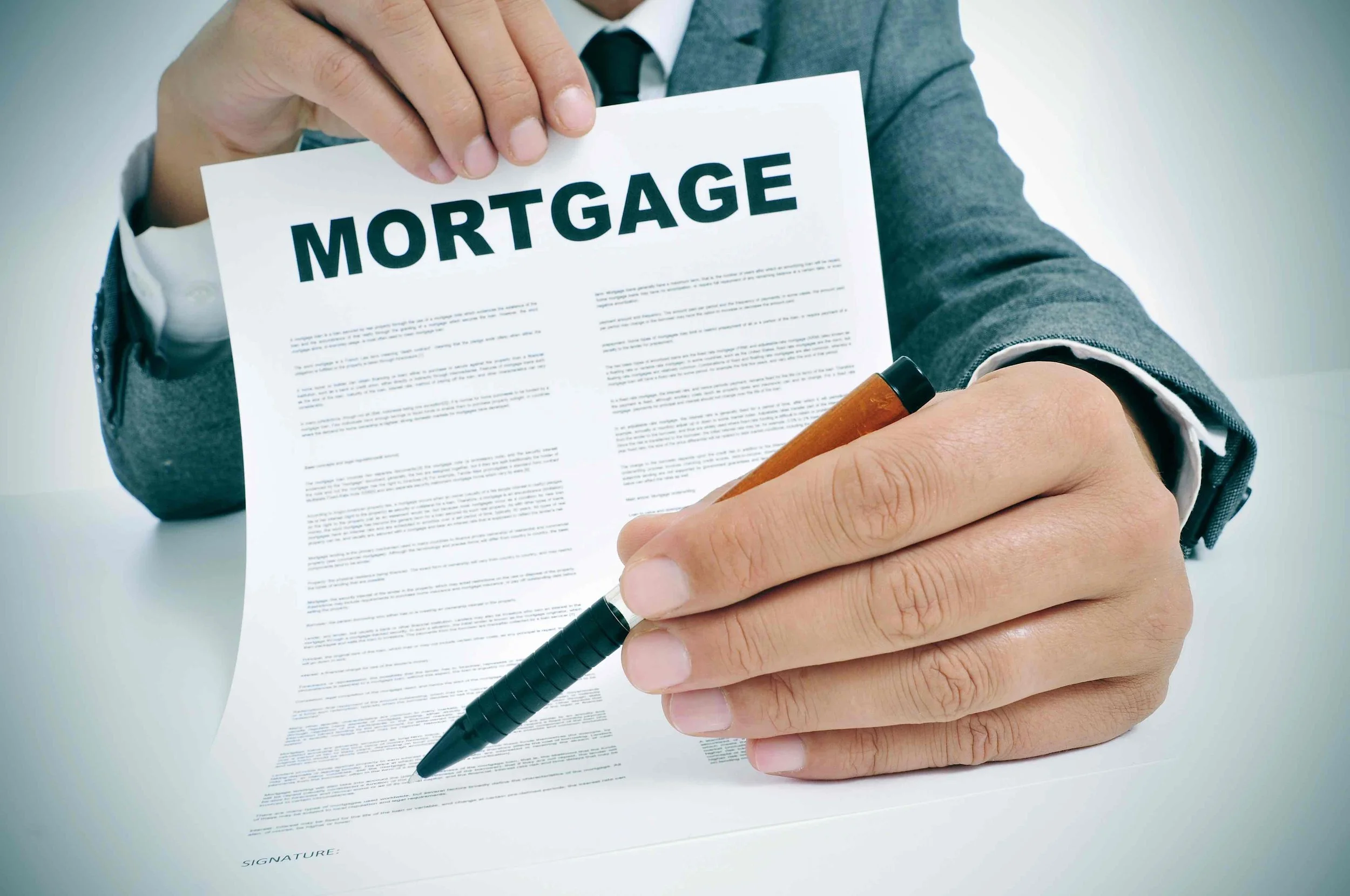 Mortgage rates plunge just as home prices set another record