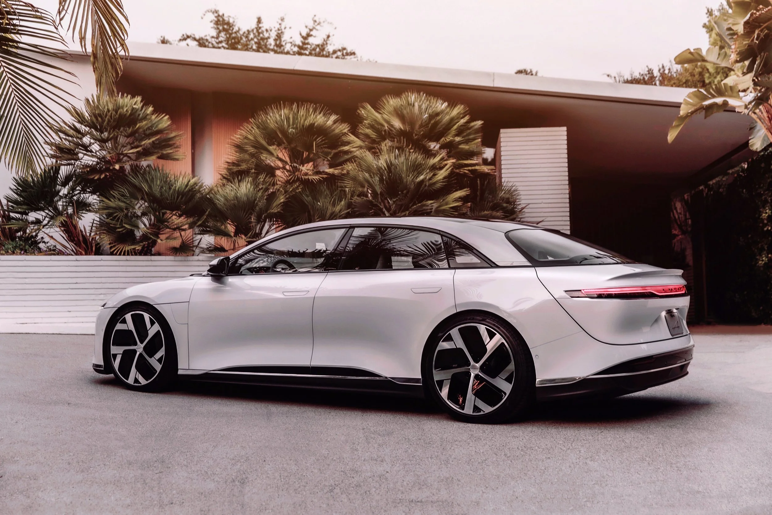 EV maker Lucid debuts its latest Tesla rival, a high-performance luxury sedan with a 446-mile range