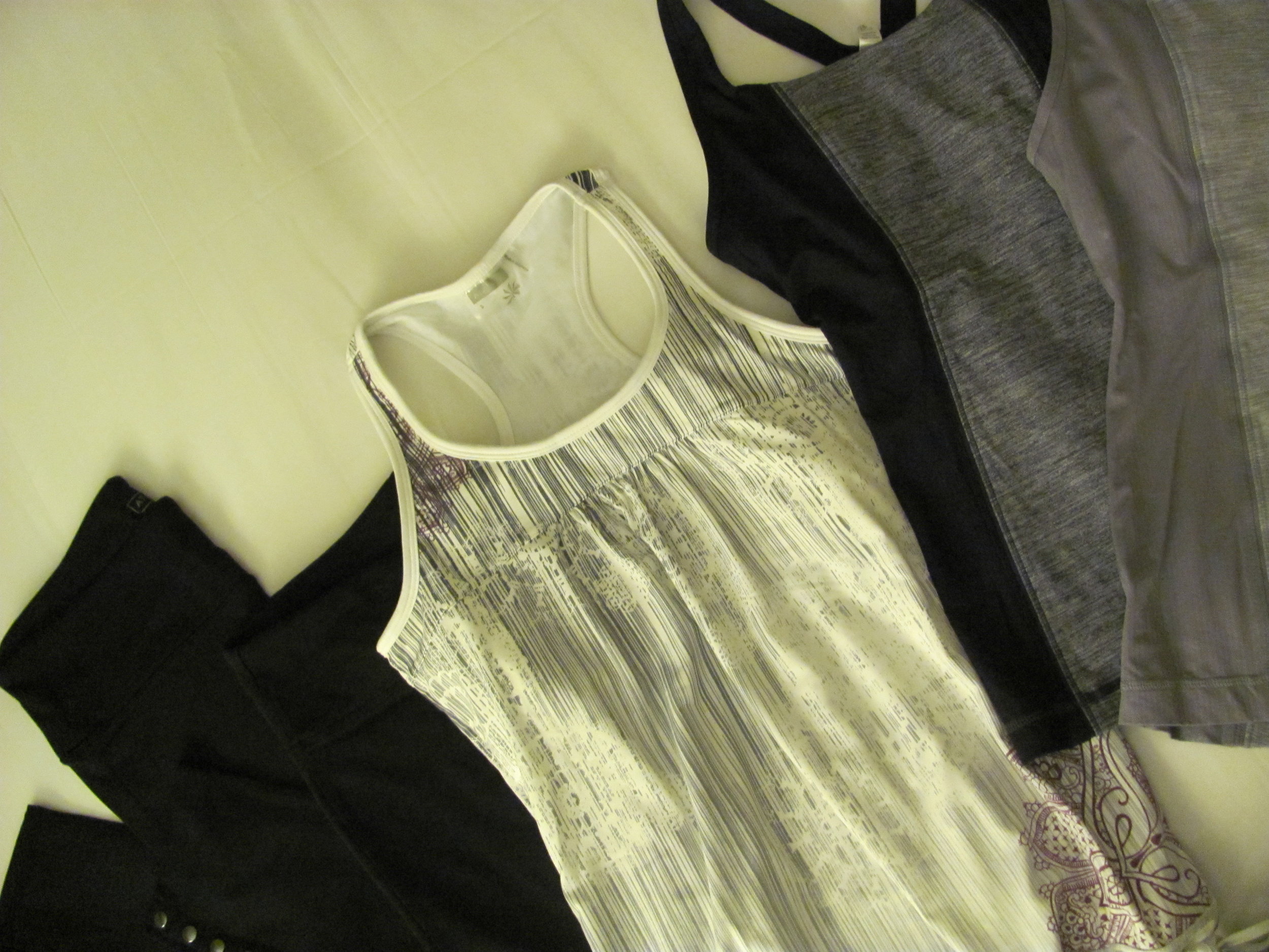 pants and patterned top from Athleta, blue & gray top and gray top from Lululemon