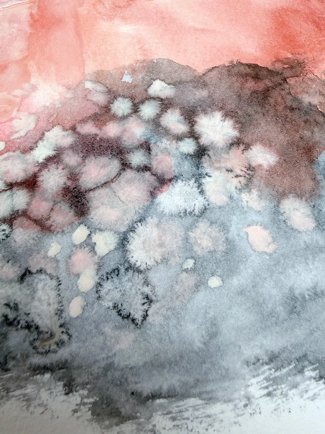 water colour texture in reds and grays