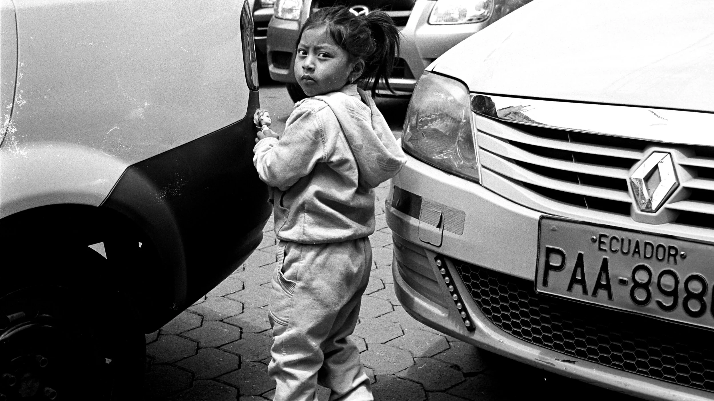 Girl between cars JPEG 2020.jpg