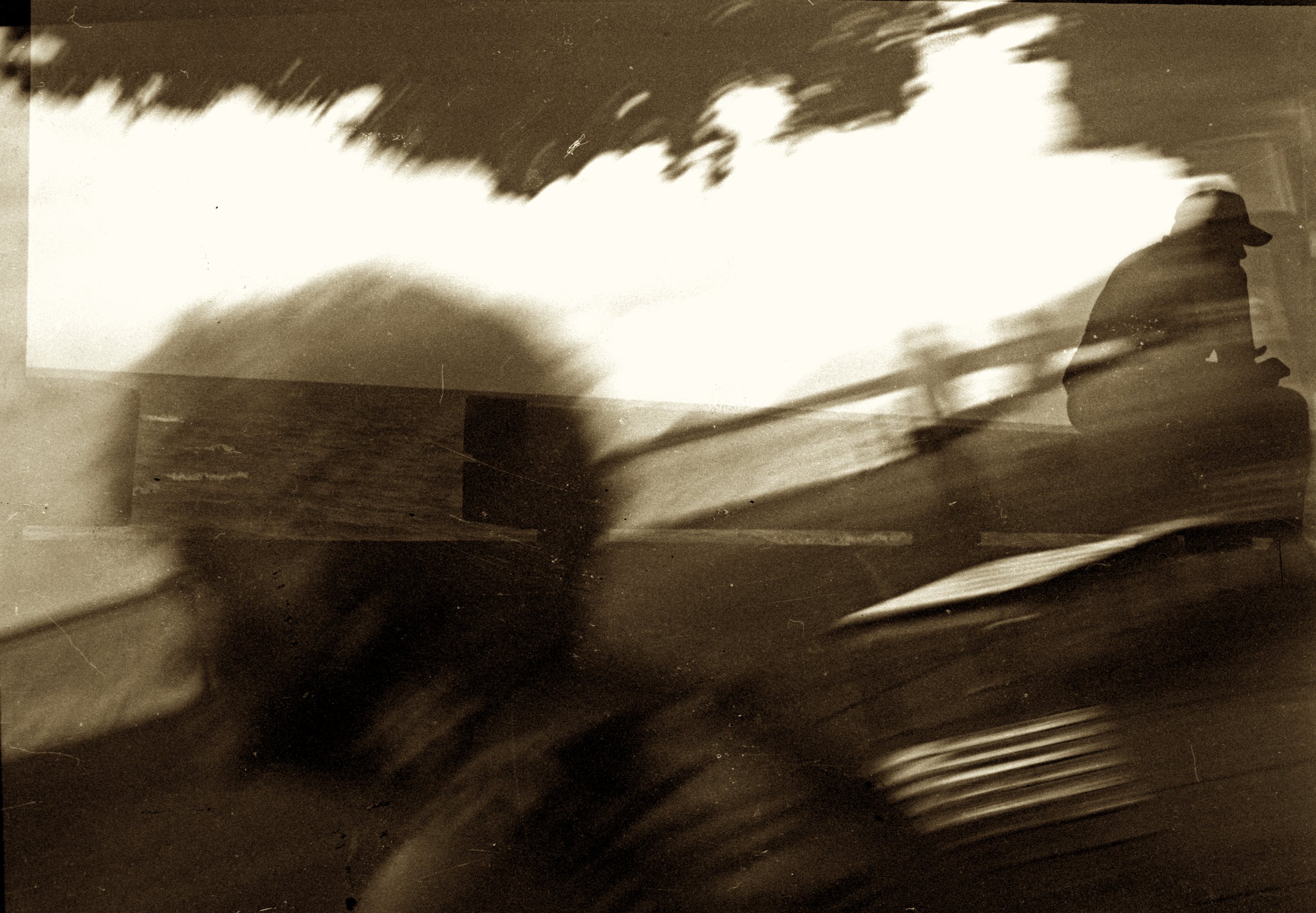 Man SEPIA on Ledge and Lady looking other way JPEG 2.jpg