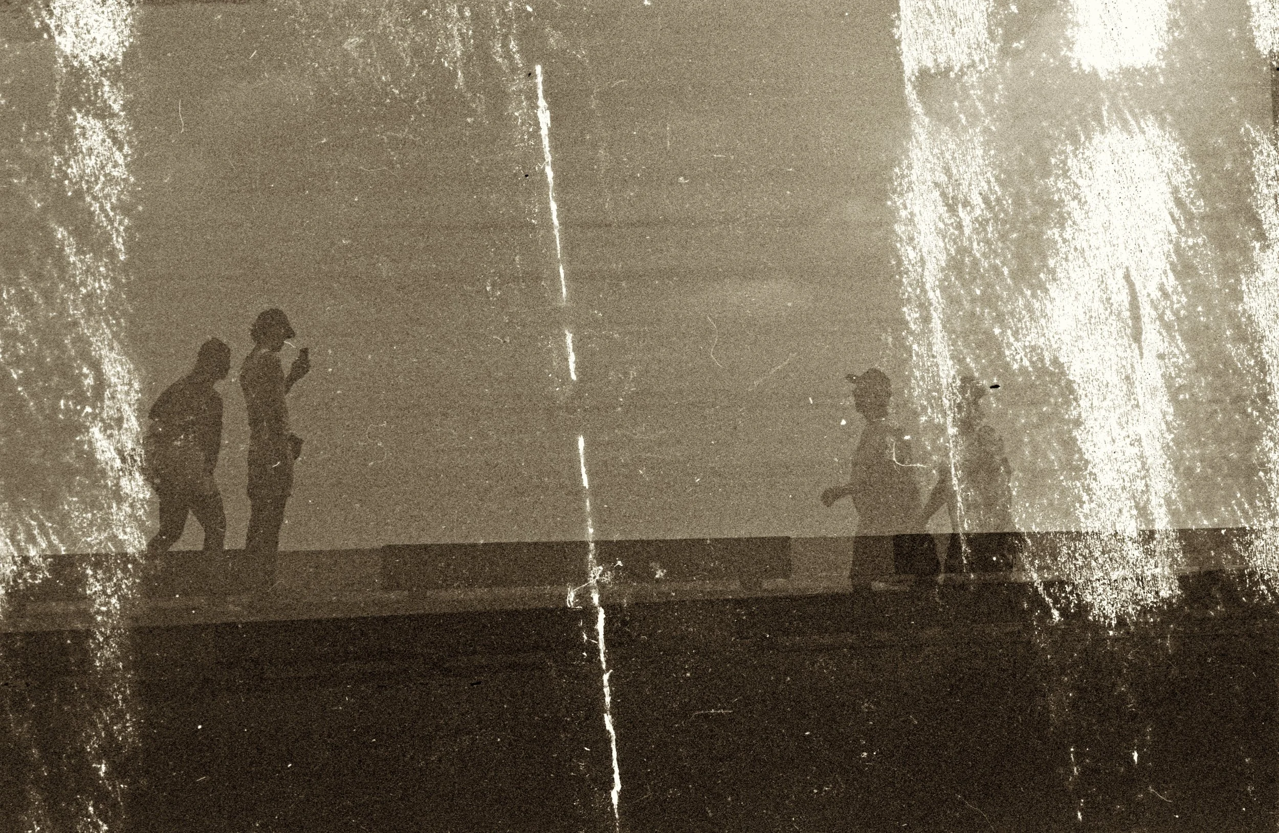 sandwiched walkers JPEG sepia.jpg