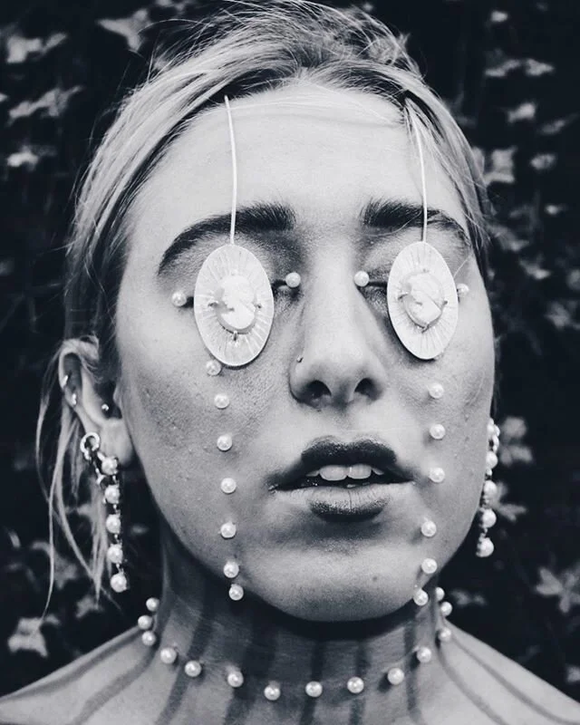 &ldquo;Pursuit of Perfection&rdquo; eye-piece
.
Silver with prong-set shell cameos
.

Cameos are beautiful figures of women carved into shells, it symbolizes status, wealth, and lust for perfection. I placed them over the eyes like &ldquo;eye coins&r