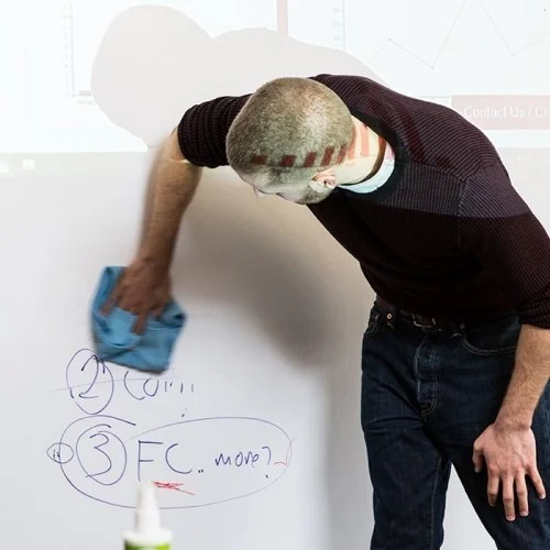 erasing-marker-on-smart-whiteboard-wallpaper-low-sheen-with-projected-image.jpg