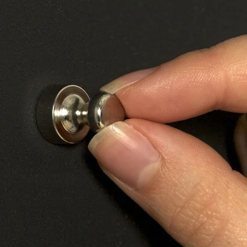 close-up-shot-of-magnet-on-super-magnetic-paint-magnetic-wall.jpg