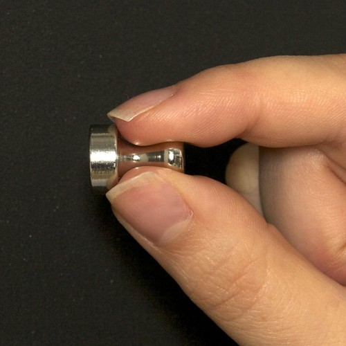 magnet-being-stuck-up-on-wall-with-super-magnetic-paint.jpg
