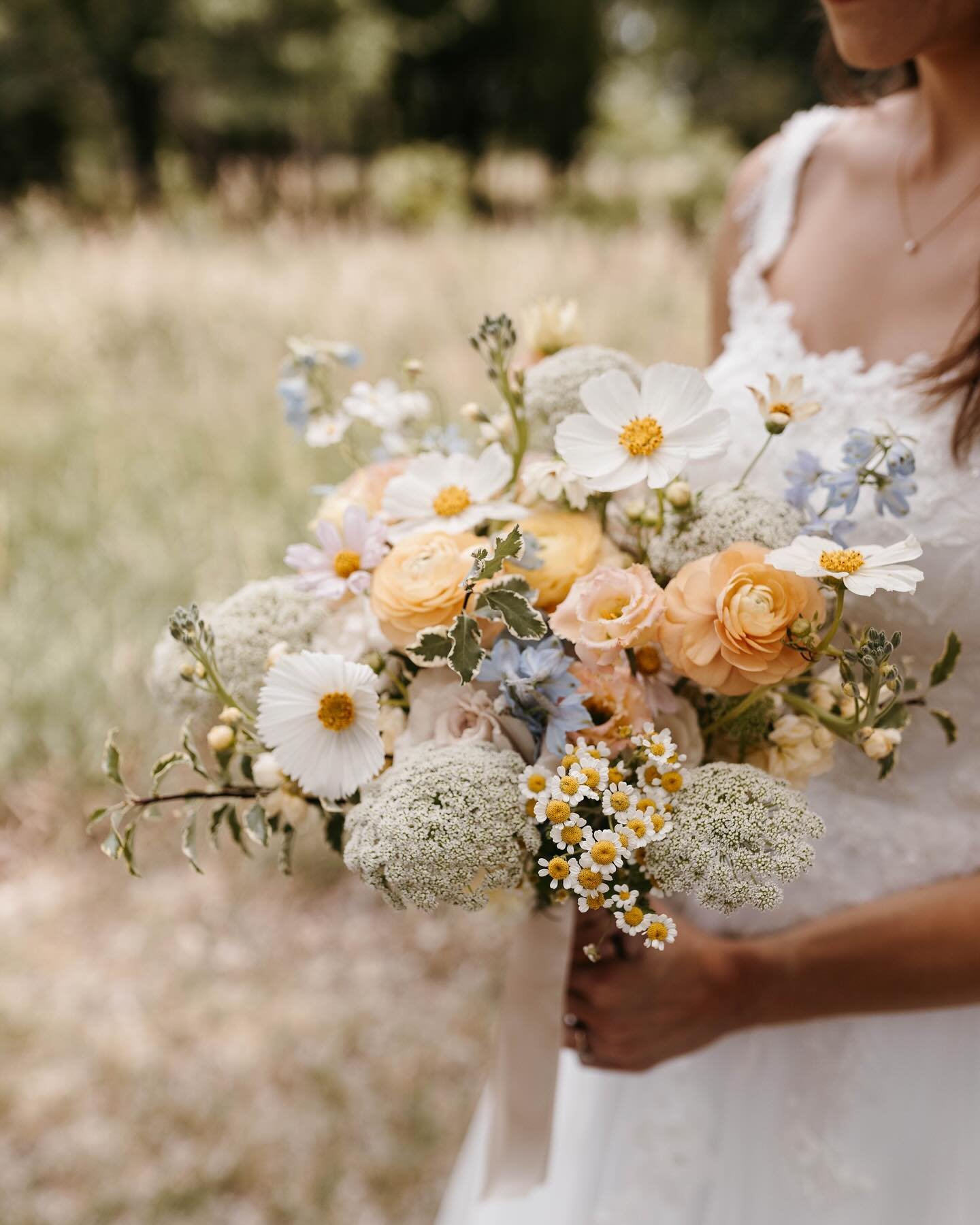 Kara&rsquo;s bouquet: I&rsquo;ll never forget the giddiness she shared as she realized all of the details of her wedding were her favorite because it was HER WEDDING! Her flowers were carefully picked to bring all of her favorites together in one coh