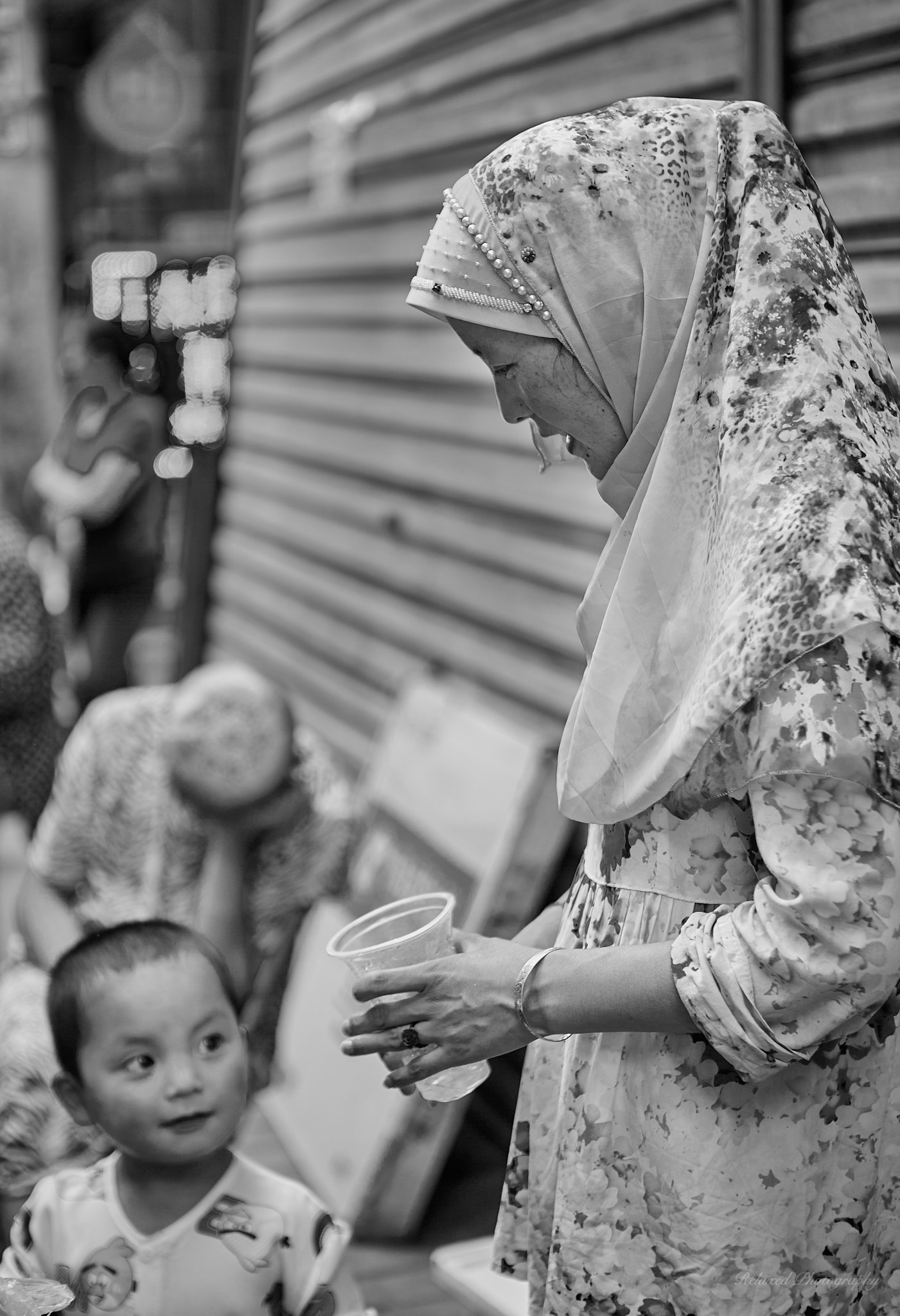 I was delighted by this moment, Mom is focussed on the child, and the child is focussed on the cup.