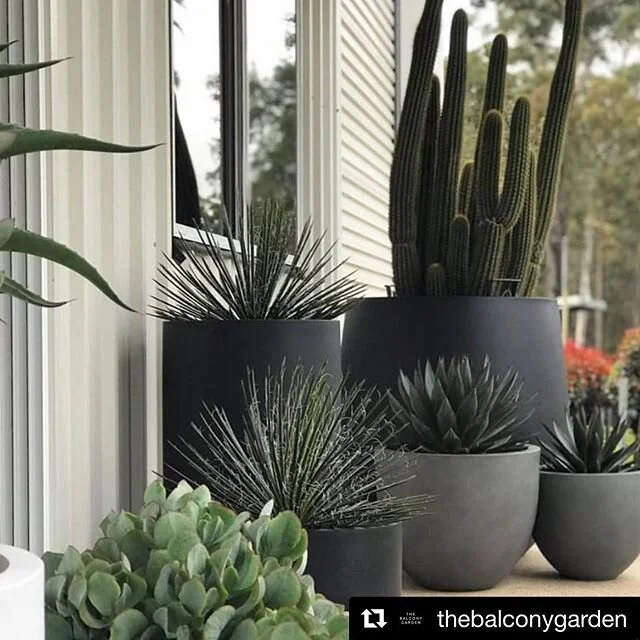 Weekend landscaping ideas: If you are looking to bring some colour to areas of your house or fill unused spaces, a cluster of pots is a great solution. The varying heights and create depth  and multiple focal points. With our current climate a select