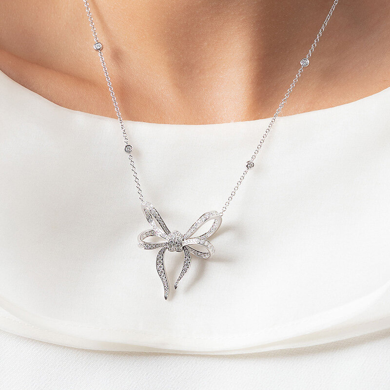 Sterling Silver Diamond Bow Pendant 11x15mm Sterling Silver Diamond Bow Pendant 11x15mm