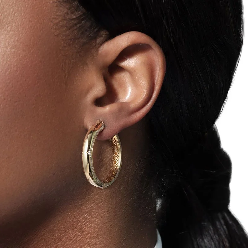 The-Nile-New Edition-18 Karat-Yellow Gold-White Diamonds-Hoop Earrings-model.jpg