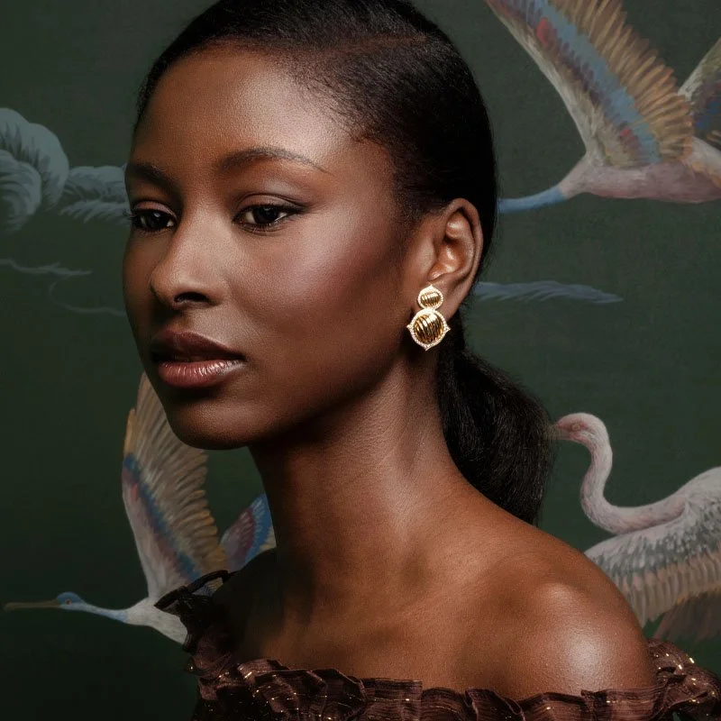 The Nile-18 karat-gold-diamonds-earrings-model.jpg