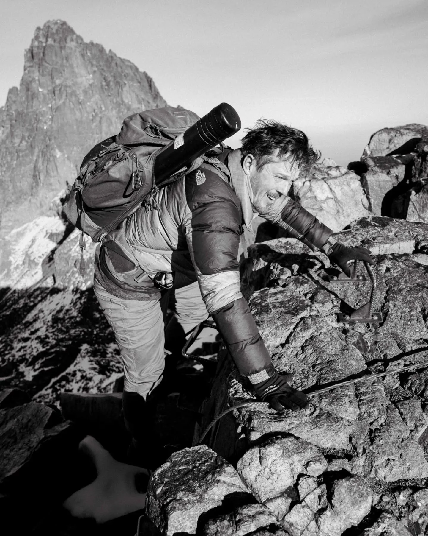Summit sunrise at Point Lenana, Mt.Kenya. Thin air, frozen trails, and the first light breaking over kenya&rsquo;s highest peaks. Paul, our kikuyu guide, shared how many in his community believe Mount Kenya is a holy mountain, a sacred place where go
