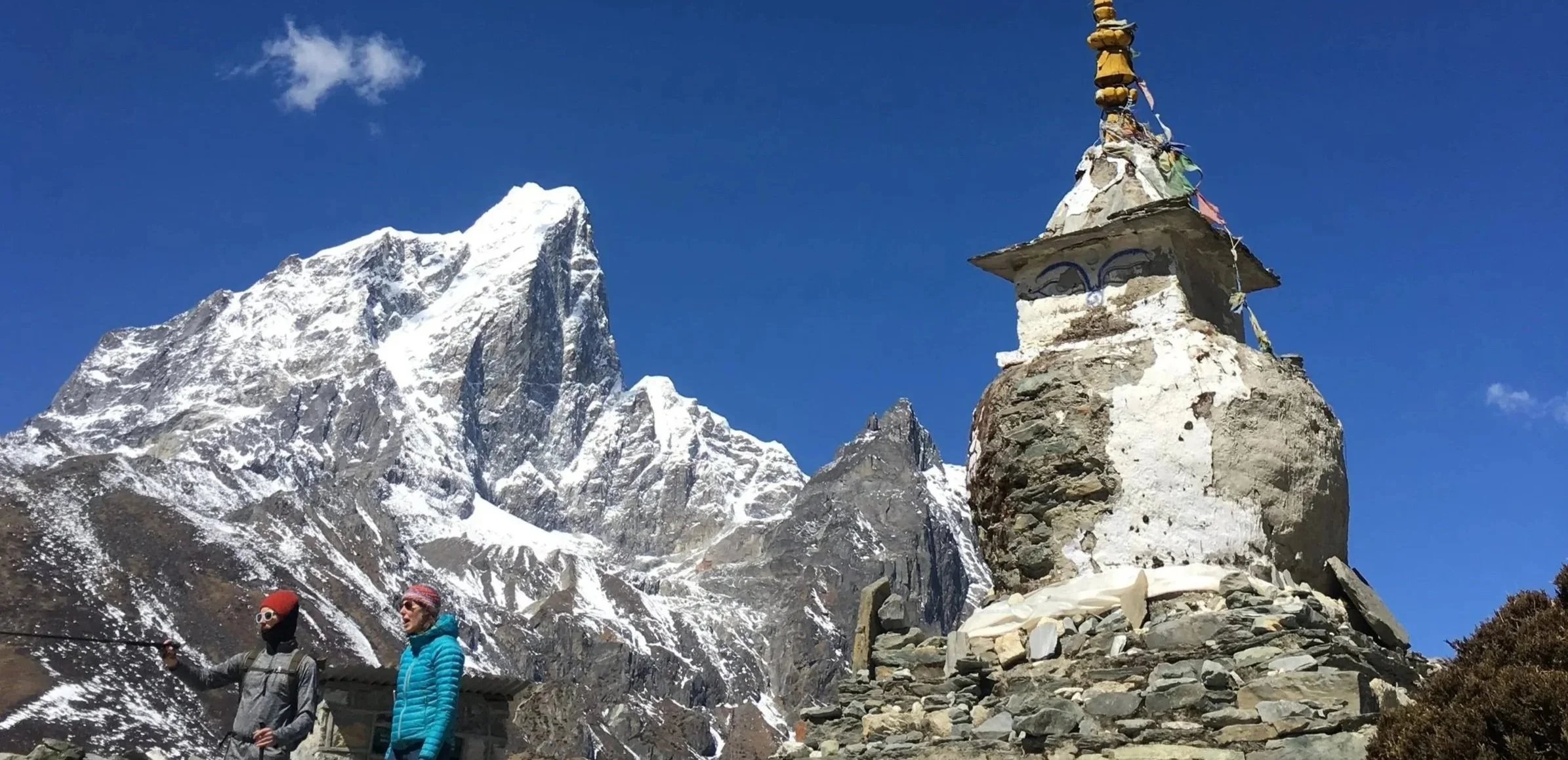 Mountain view and Buddhist stupa on the trail through the Khumbu, Nepal
