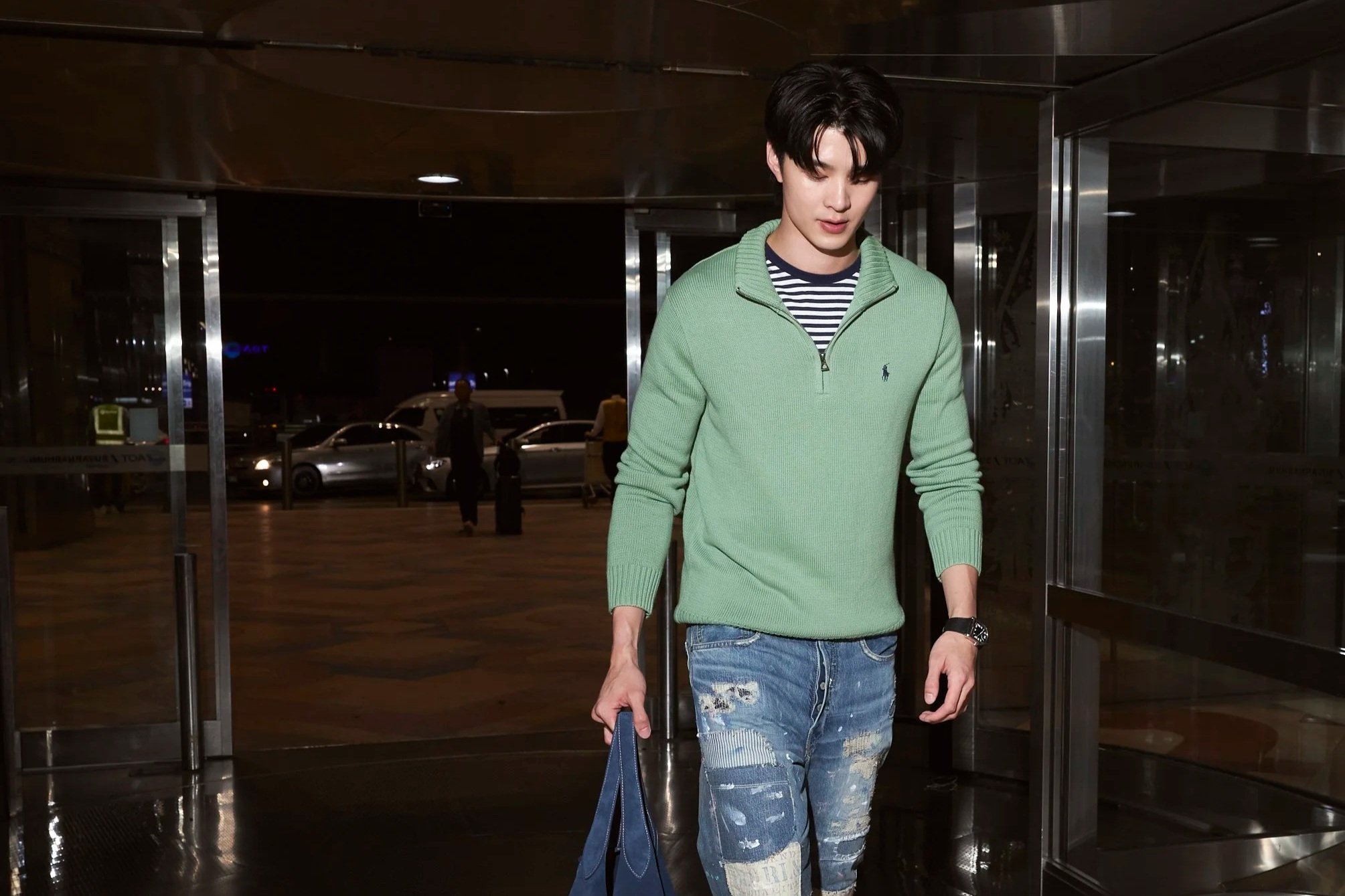 Thai Actor Meen Nichakoon Dressed in Polo Ralph Lauren Enroute to Milan for the Ralph Lauren Purple Label and Polo Ralph Lauren SP27 Show
