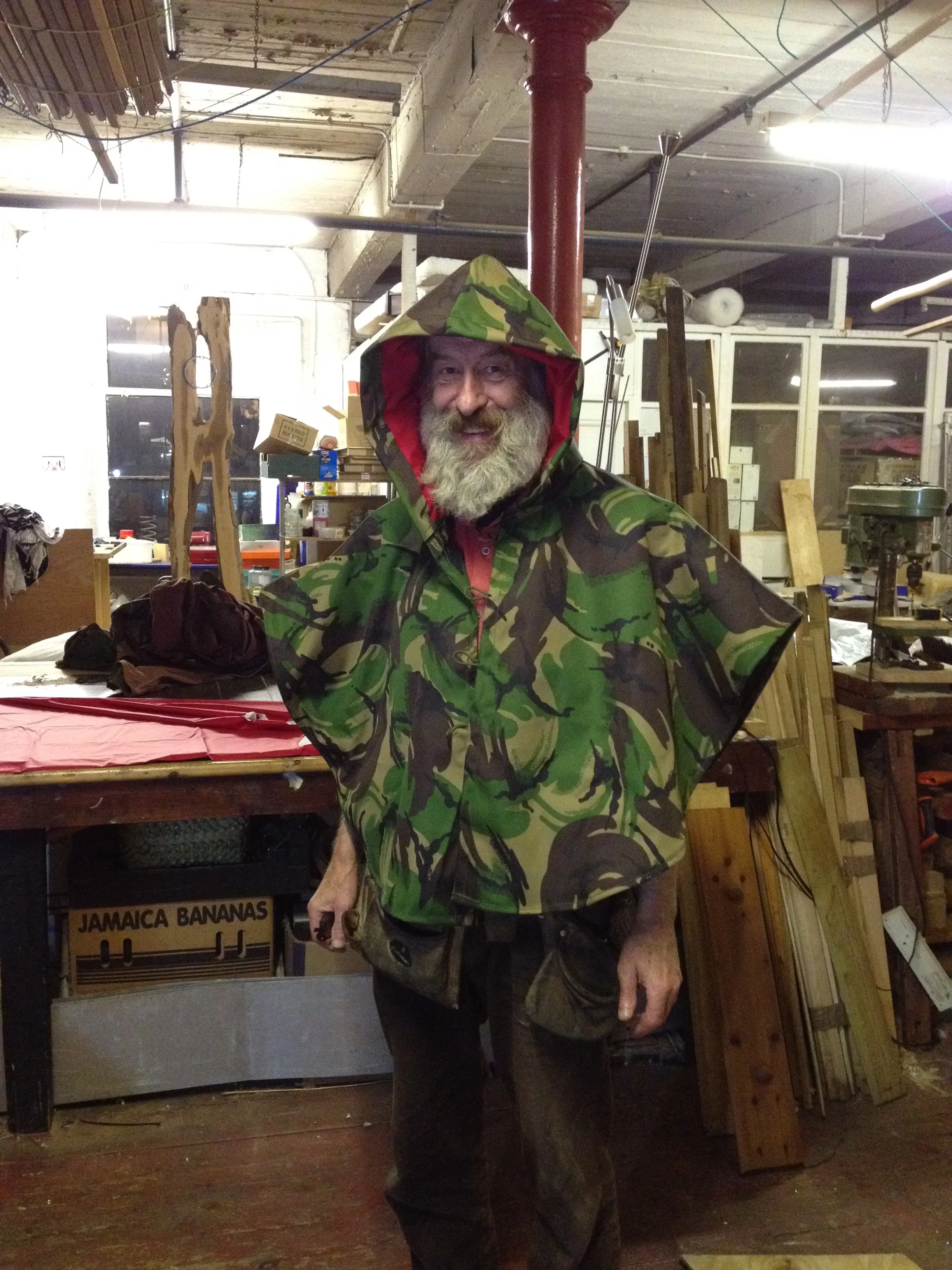 Glen Roberts wearing raincoat made from leftover materials