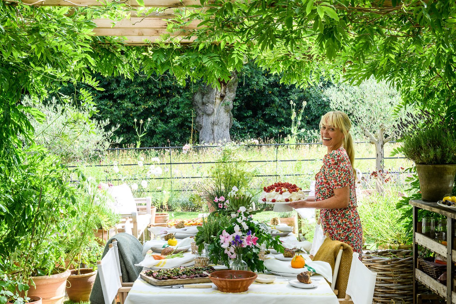 Clo holding pavlova in pergola - Summer Broadspear.jpg
