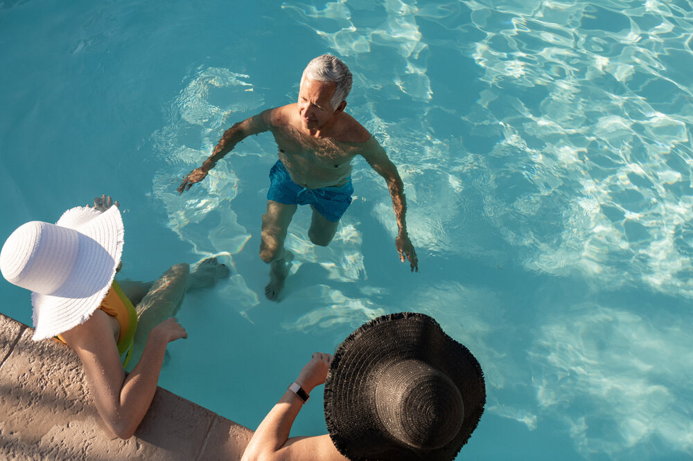 friends-talking-in-swimming-pool.jpg