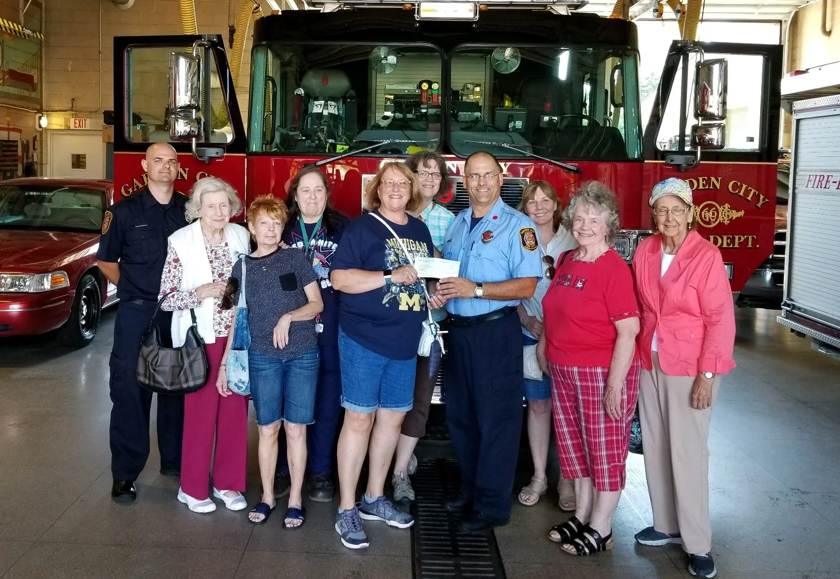 Giving donation to the GC Fire Department for Smoke Detectors for the community.