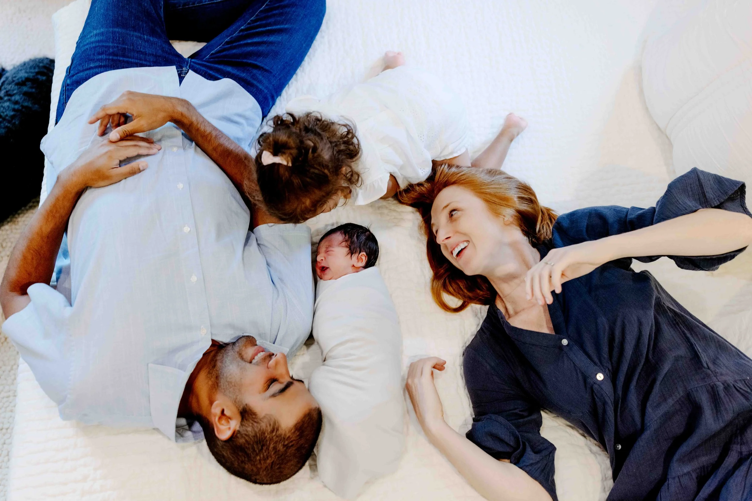 Relaxed family moment captured in natural light newborn photos