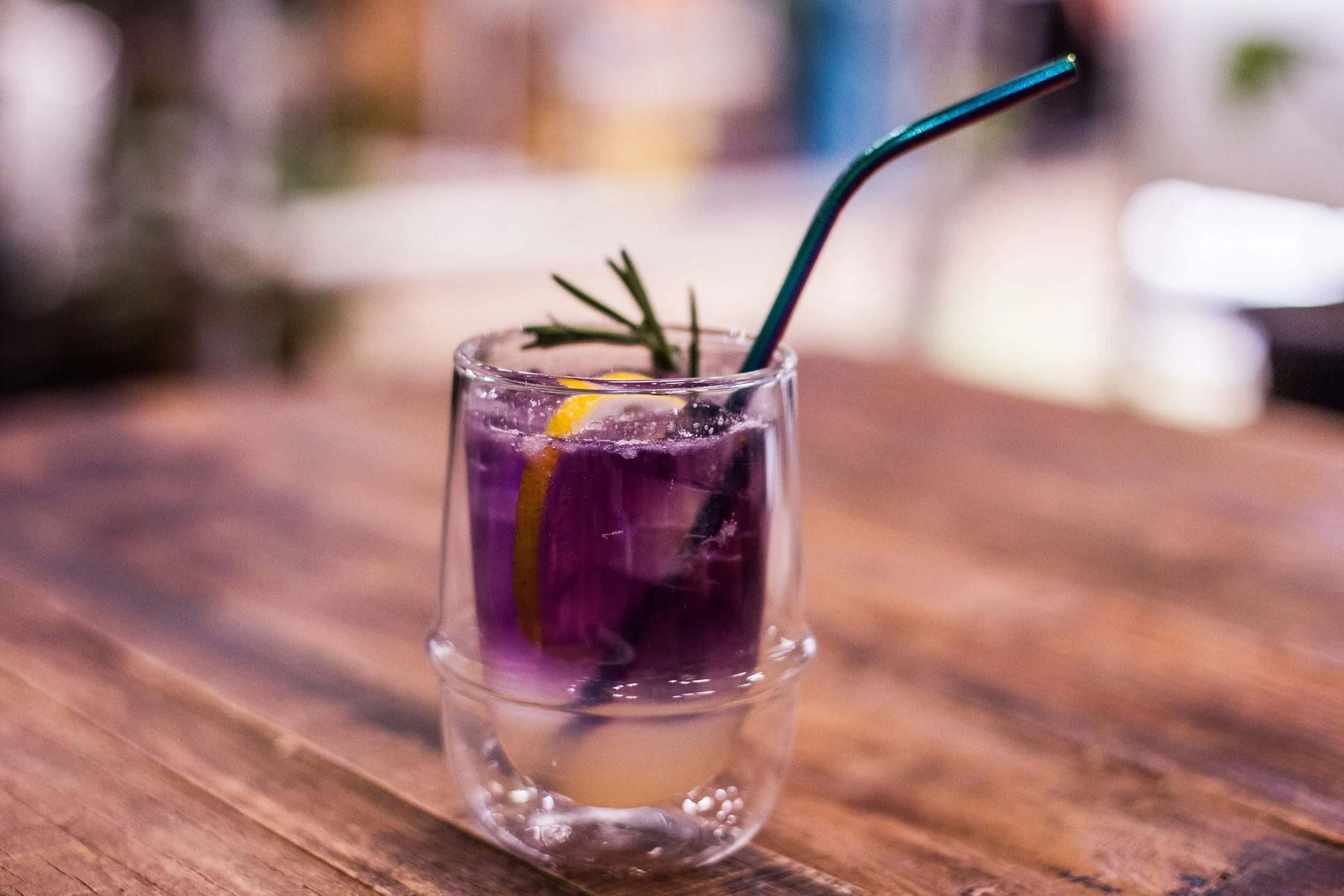 A refreshing purple butterfly pea flower tea celebrates the completion of a productive organizing session and a well-earned moment to recharge.