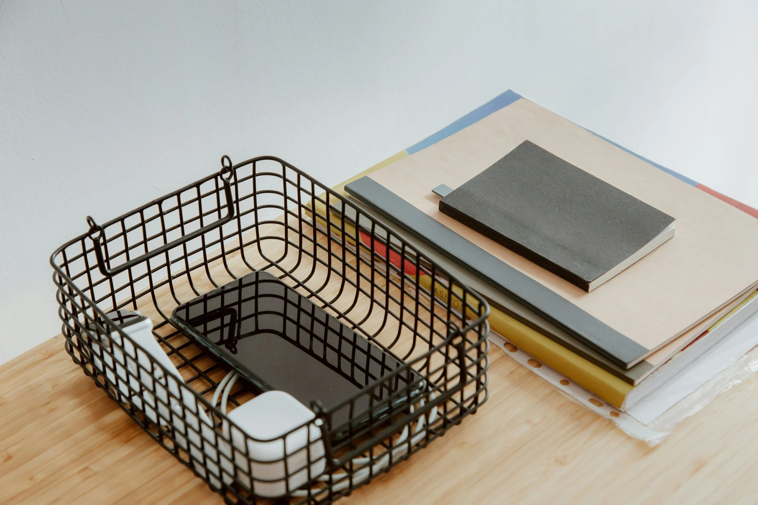 Organized paperwork gathered into neat stacks, creating a calm and approachable starting point for decluttering important documents.